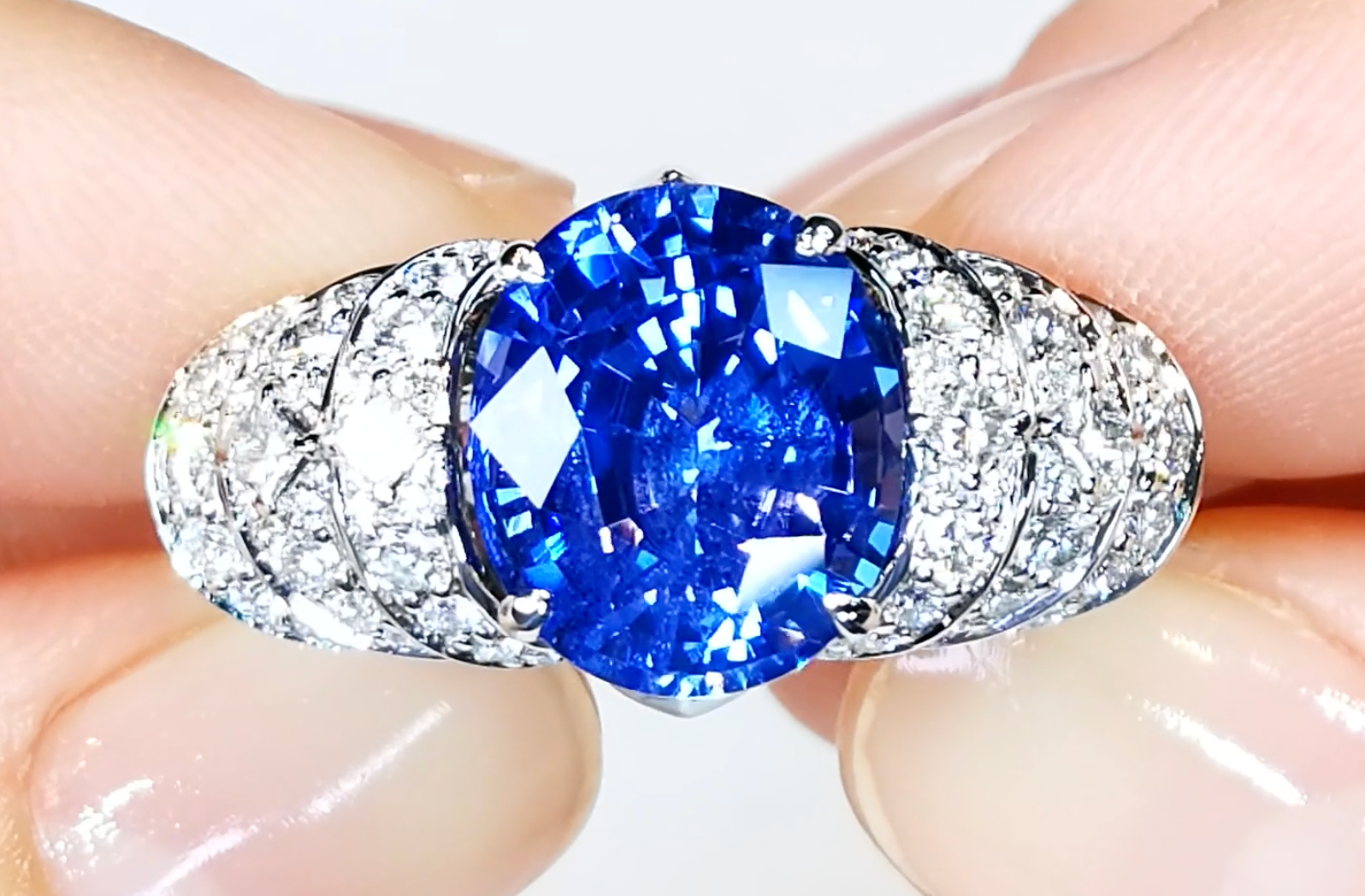 6.69ct Unheated Ceylon Blue Sapphire Ring with D Flawless Diamonds set in 18K White Gold