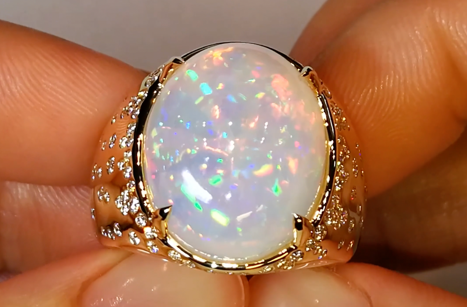 14.58ct Ethiopian Opal Ring with D Flawless Diamonds set in 18K Yellow Gold