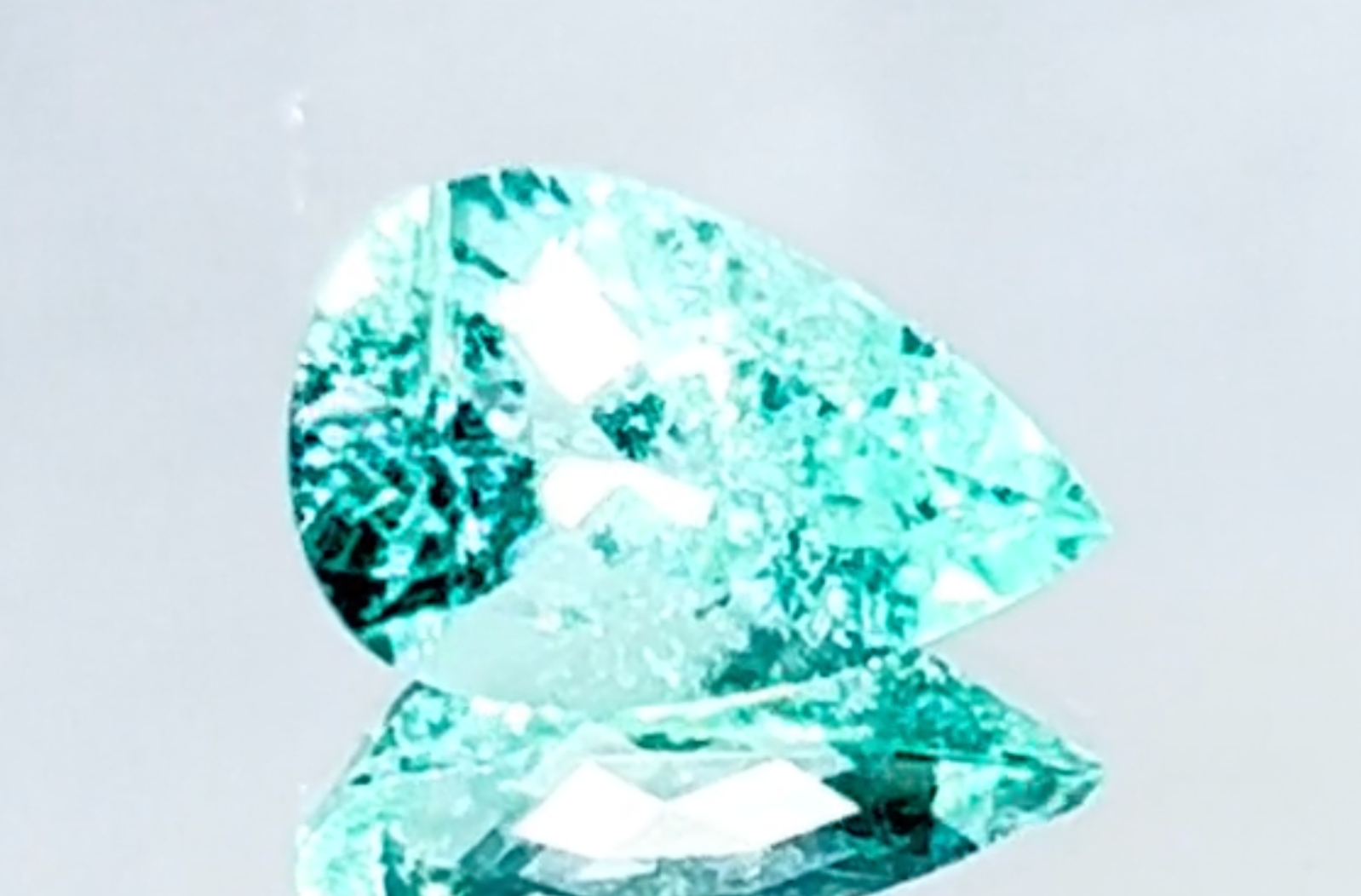 4.94ct Neon Paraiba Tourmaline Ring with D Flawless Diamonds set in 18K White Gold