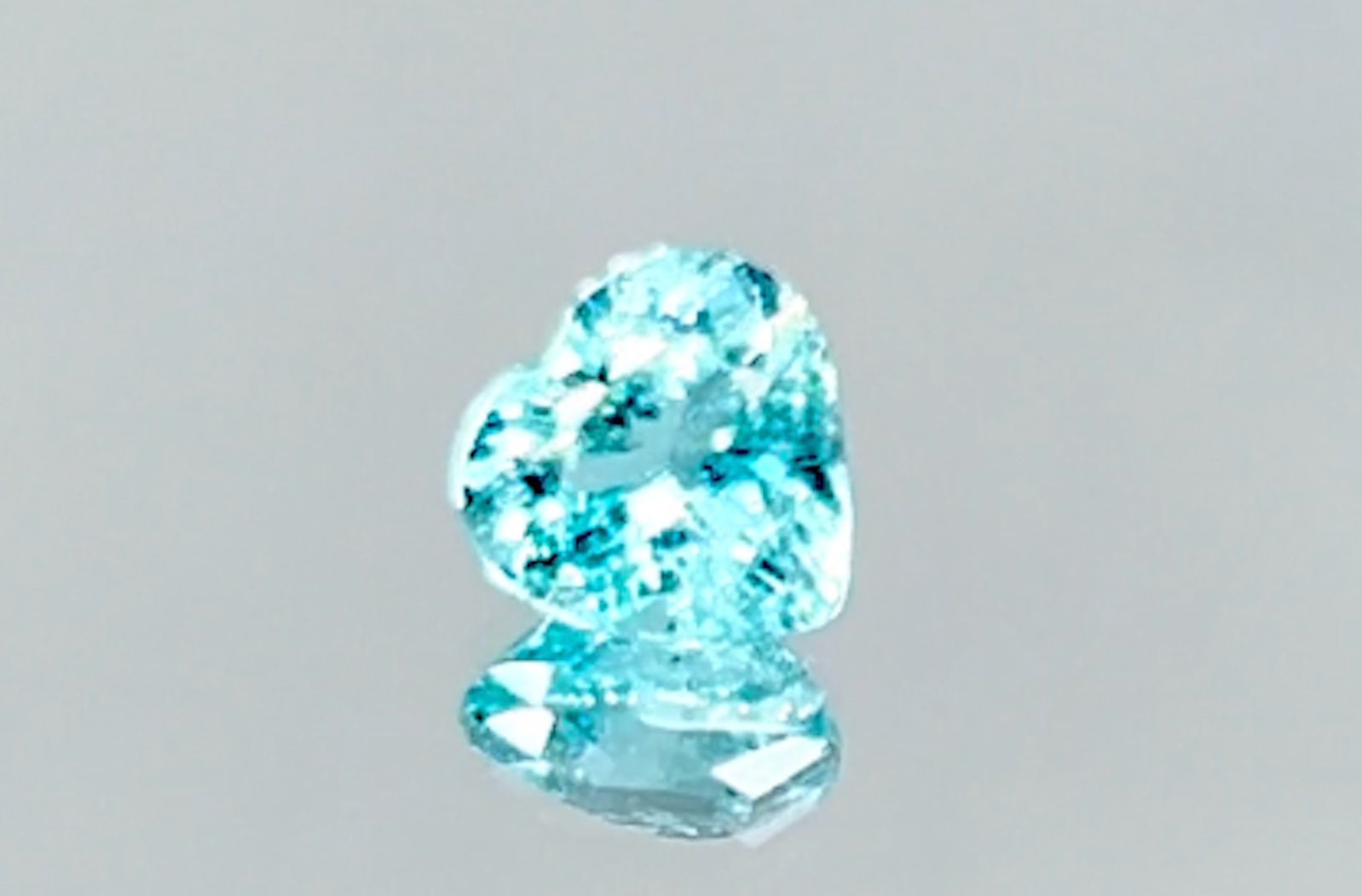 1.04ct Neon Paraiba Tourmaline Ring with D Flawless Diamonds set in 18K Yellow Gold