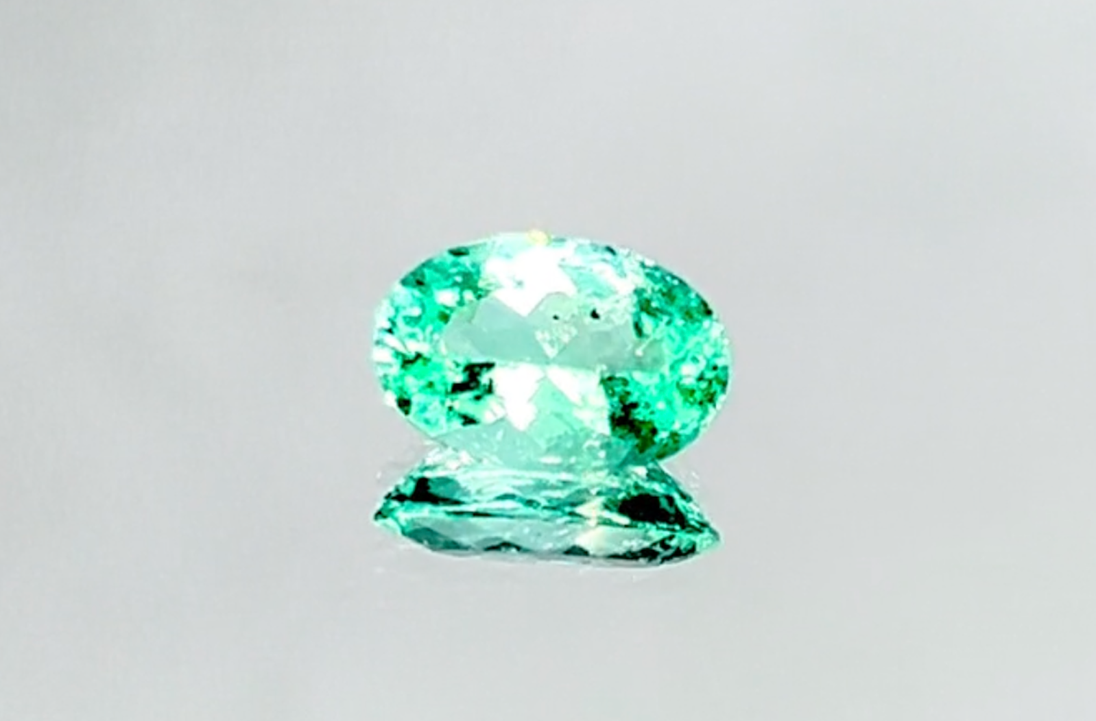 1.23ct Neon Paraiba Tourmaline Ring with D Flawless Diamonds set in 18K White Gold