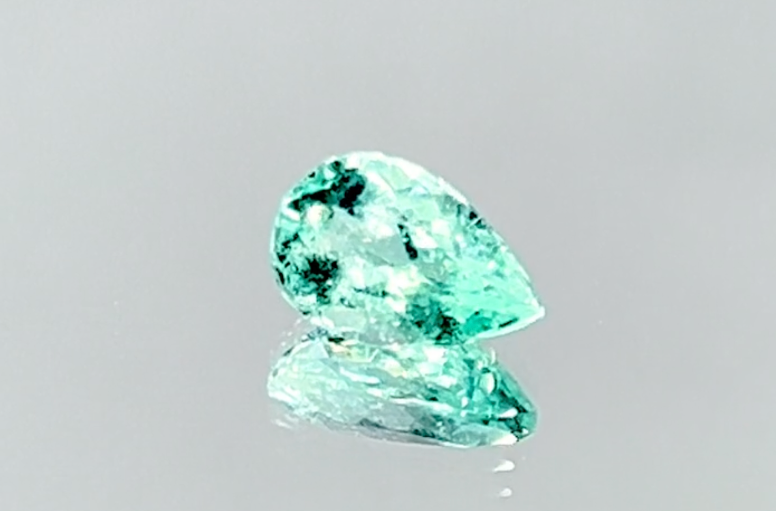 1.16ct Neon Paraiba Tourmaline Ring with D Flawless Diamonds set in 18K White Gold