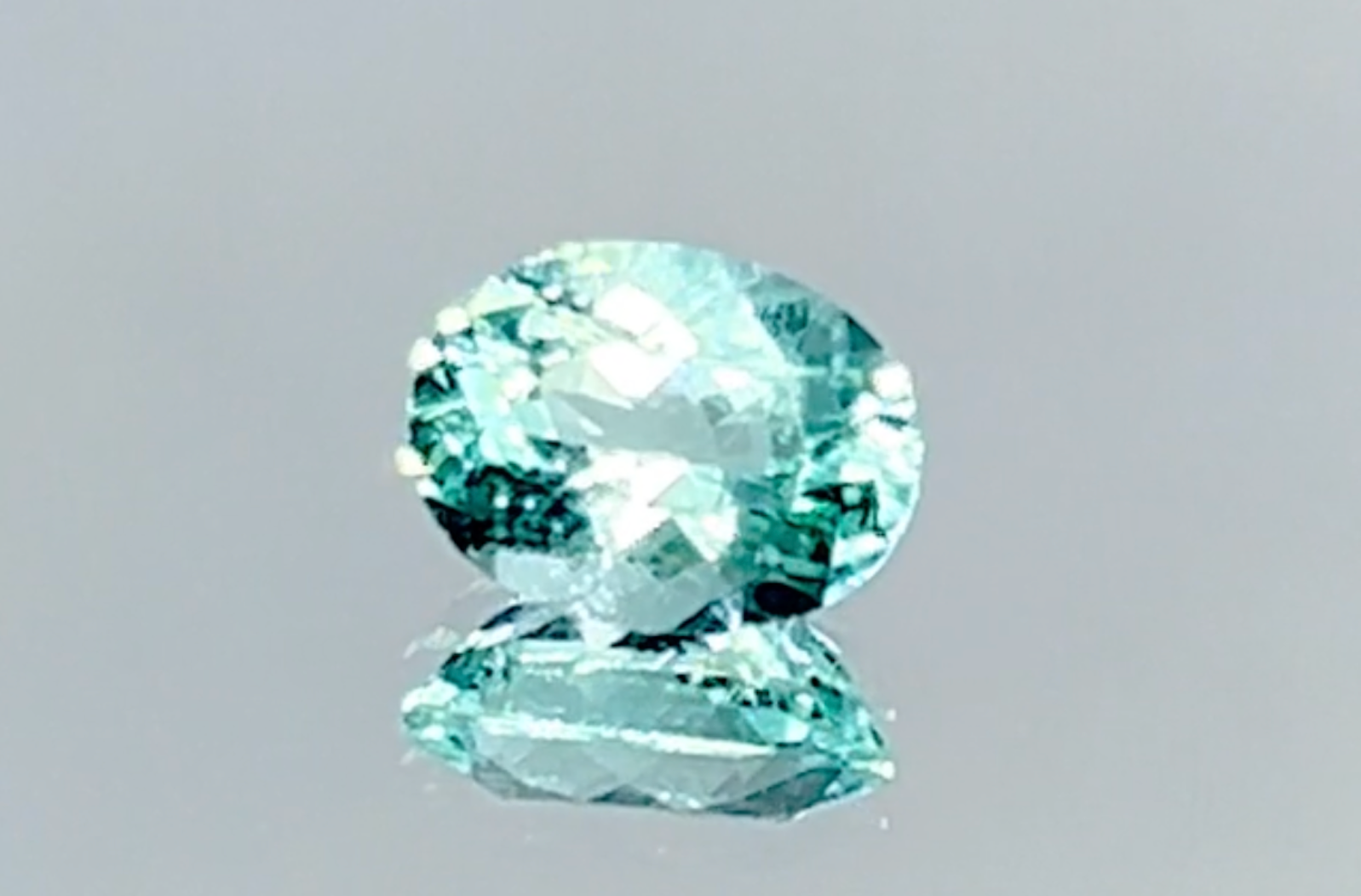1.08ct Neon Paraiba Tourmaline Ring with D Flawless Diamonds set in 18K White Gold