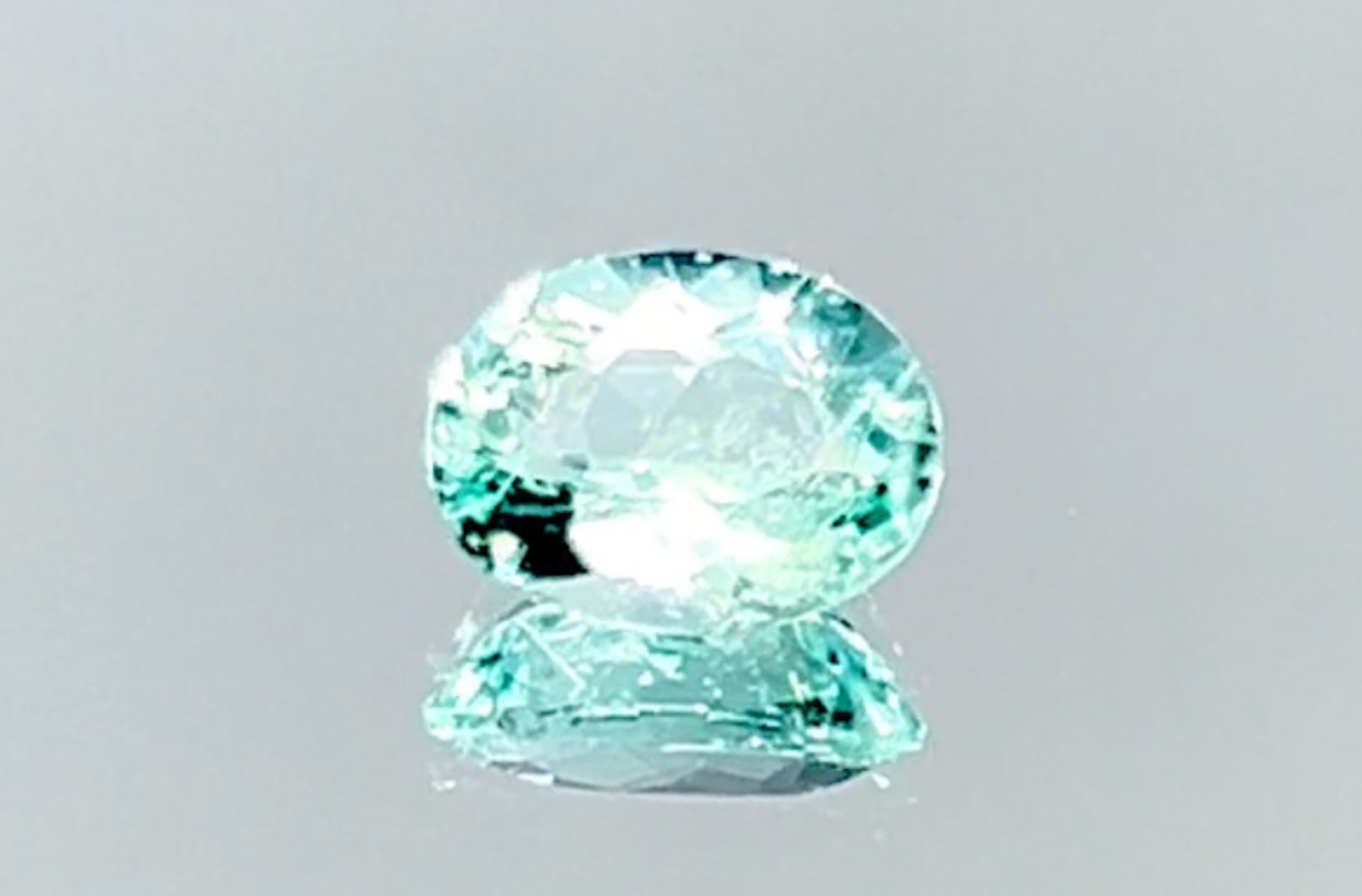 0.98ct Neon Paraiba Tourmaline Ring with D Flawless Diamonds set in 18K Yellow Gold