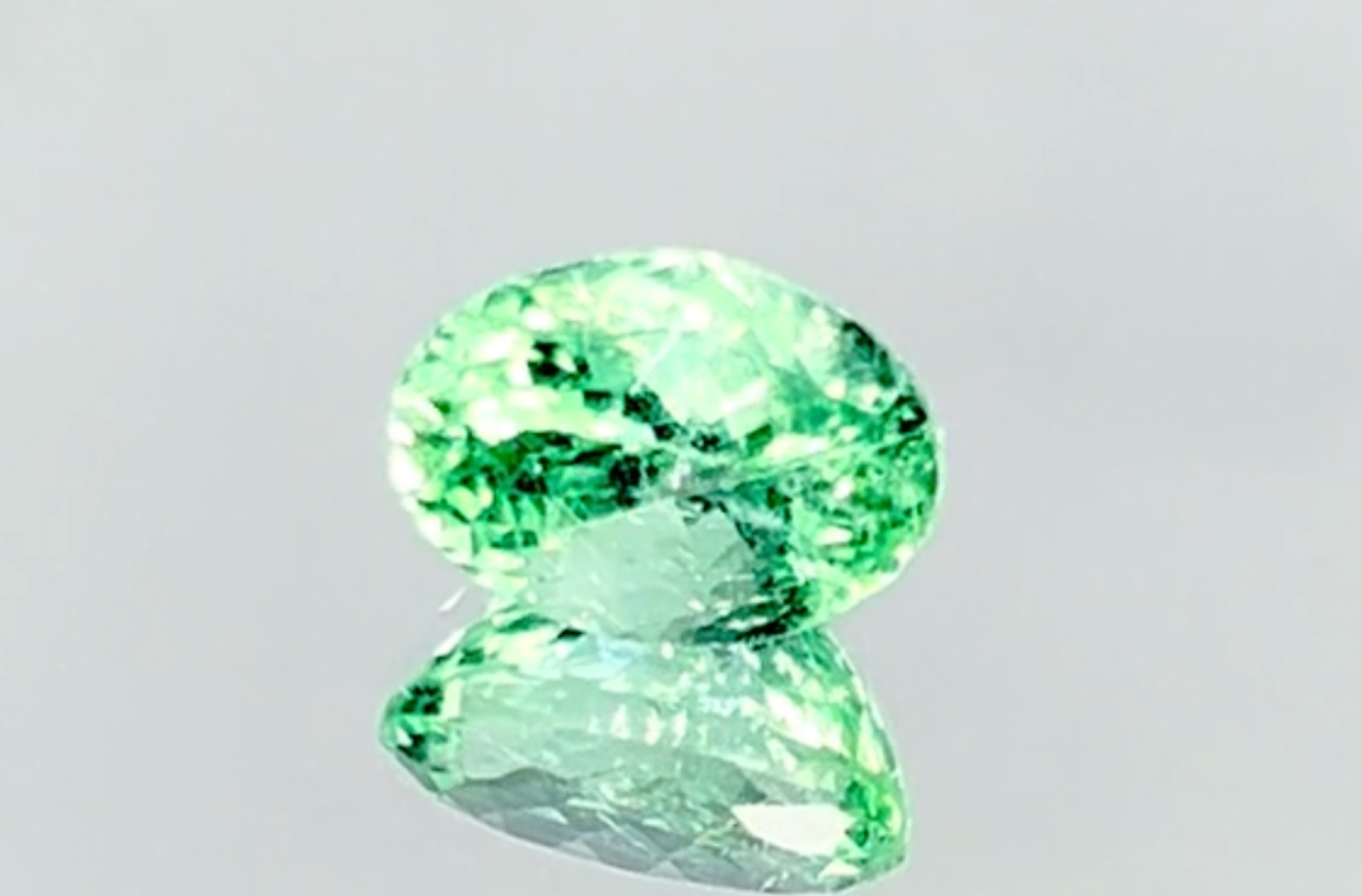 2.77ct Neon Paraiba Tourmaline Ring with D Flawless Diamonds set in 18K Yellow Gold