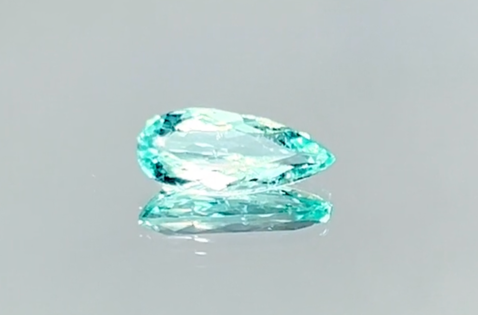 1.22ct Neon Paraiba Tourmaline Ring with D Flawless Diamonds set in 18K Yellow Gold