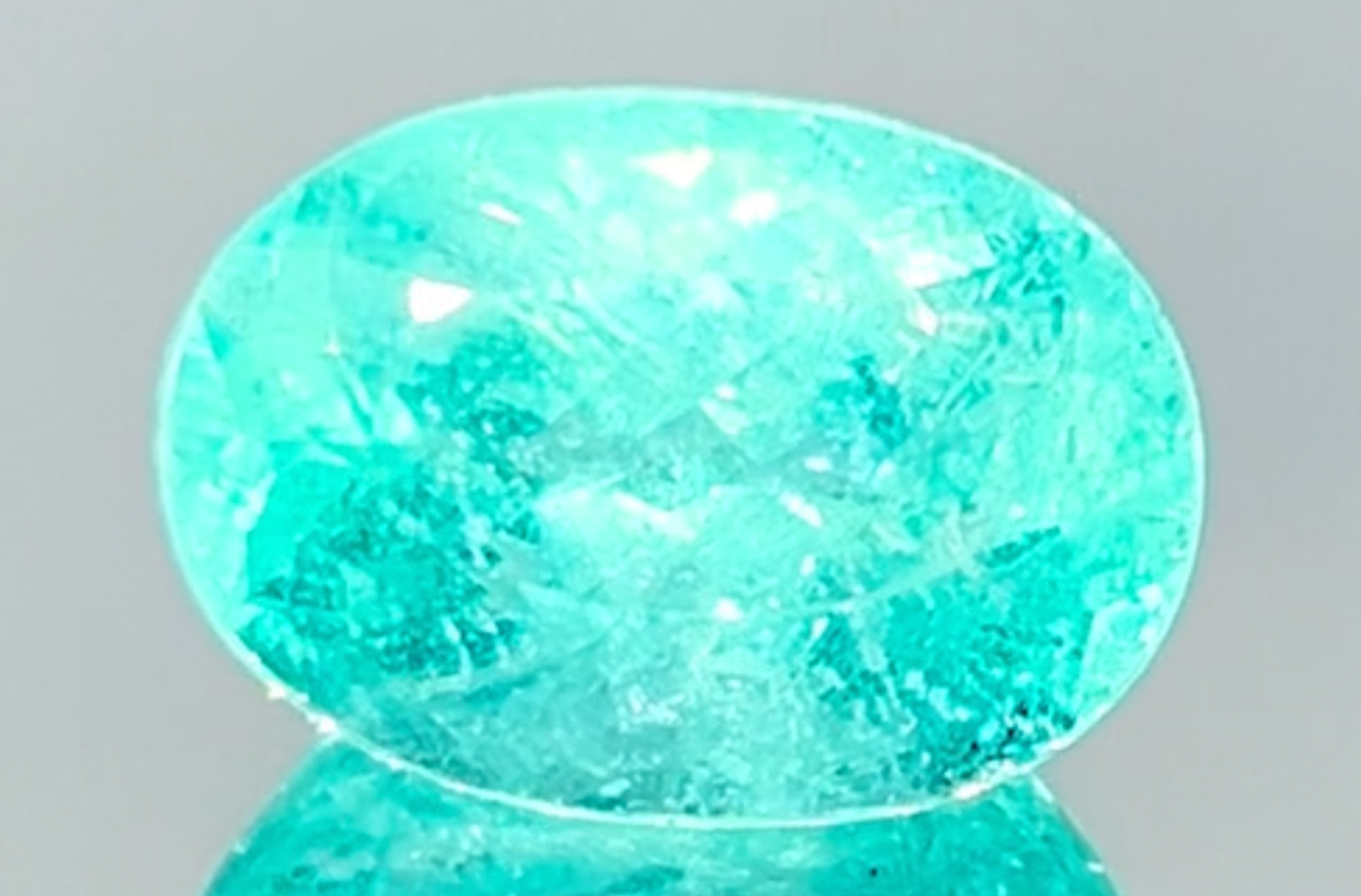 7.90ct Neon Paraiba Tourmaline Ring with D Flawless Diamonds set in 18K White Gold