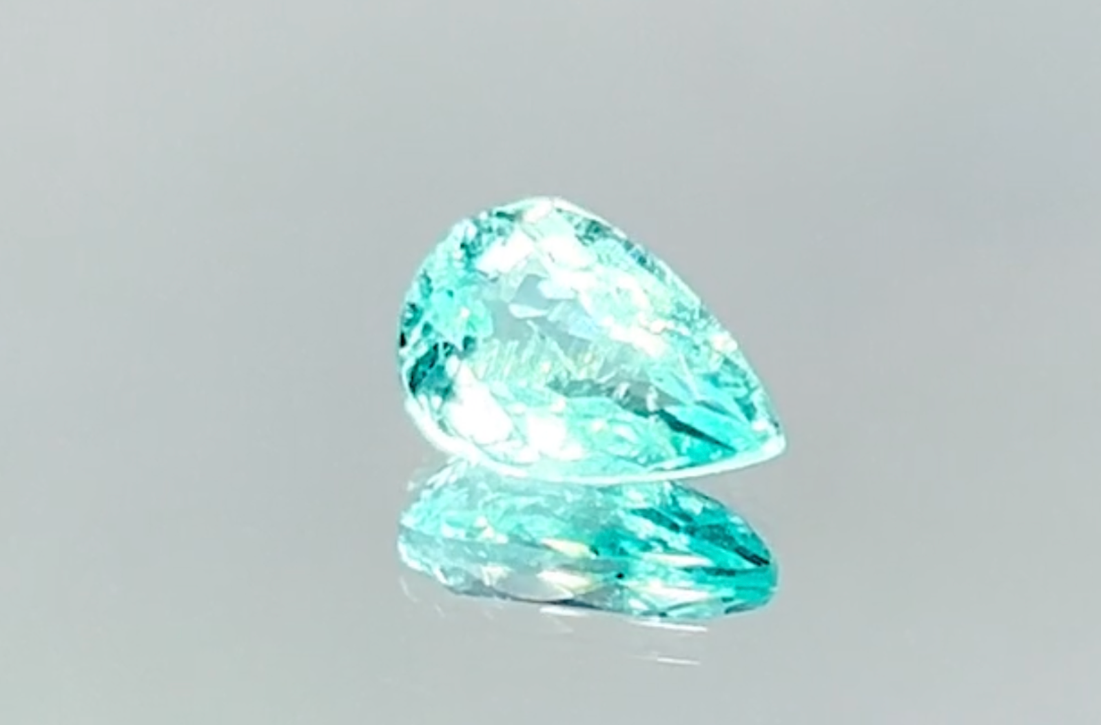 1.60ct Neon Paraiba Tourmaline Ring with D Flawless Diamonds set in 18K White Gold