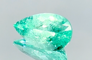 5.47ct Neon Paraiba Tourmaline Ring with D Flawless Diamonds set in 18K Yellow Gold