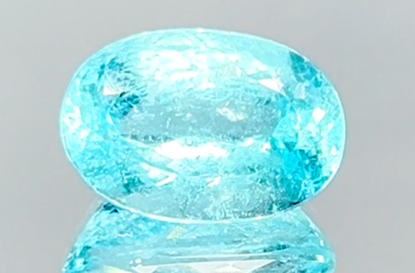 6.17ct Neon Paraiba Tourmaline Ring with D Flawless Diamonds set in 18K White Gold