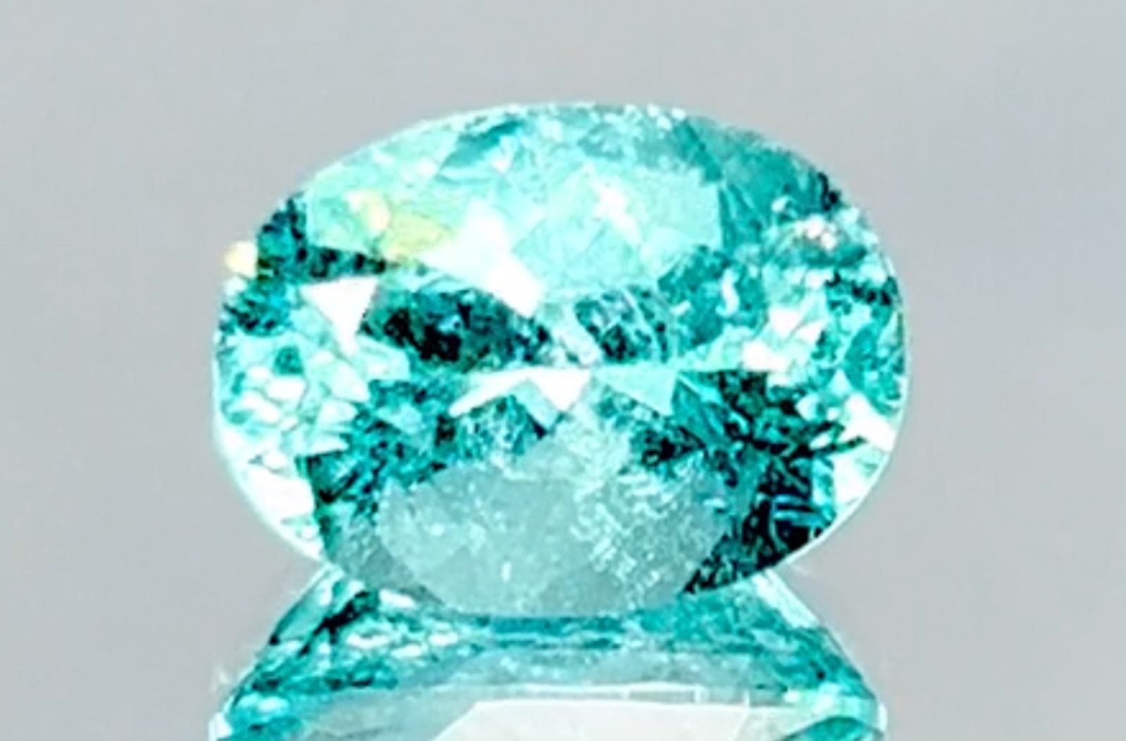 3.11ct Neon Paraiba Tourmaline Ring with D Flawless Diamonds set in 18K White Gold