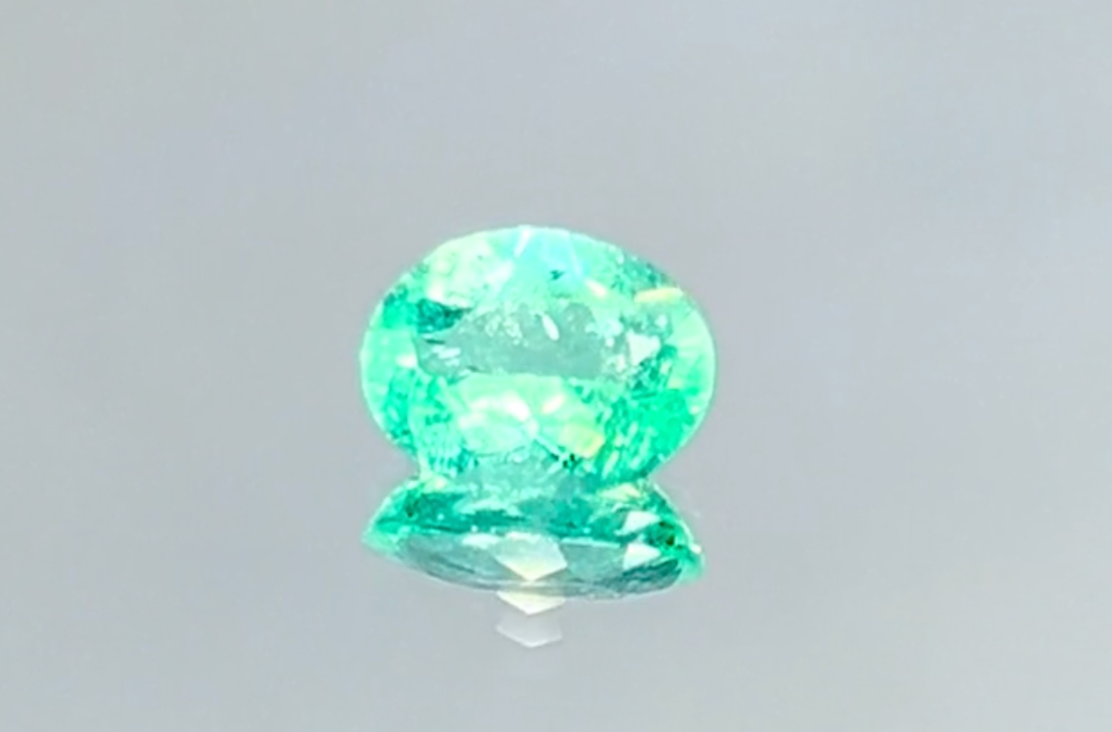 1.00ct Neon Paraiba Tourmaline Ring with D Flawless Diamonds set in 18K White Gold