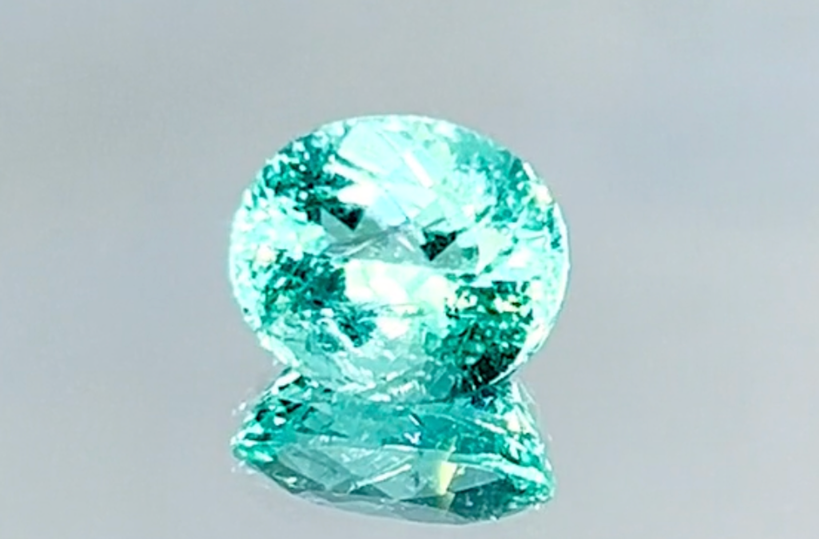2.57ct Neon Paraiba Tourmaline Ring with D Flawless Diamonds set in 18K White Gold