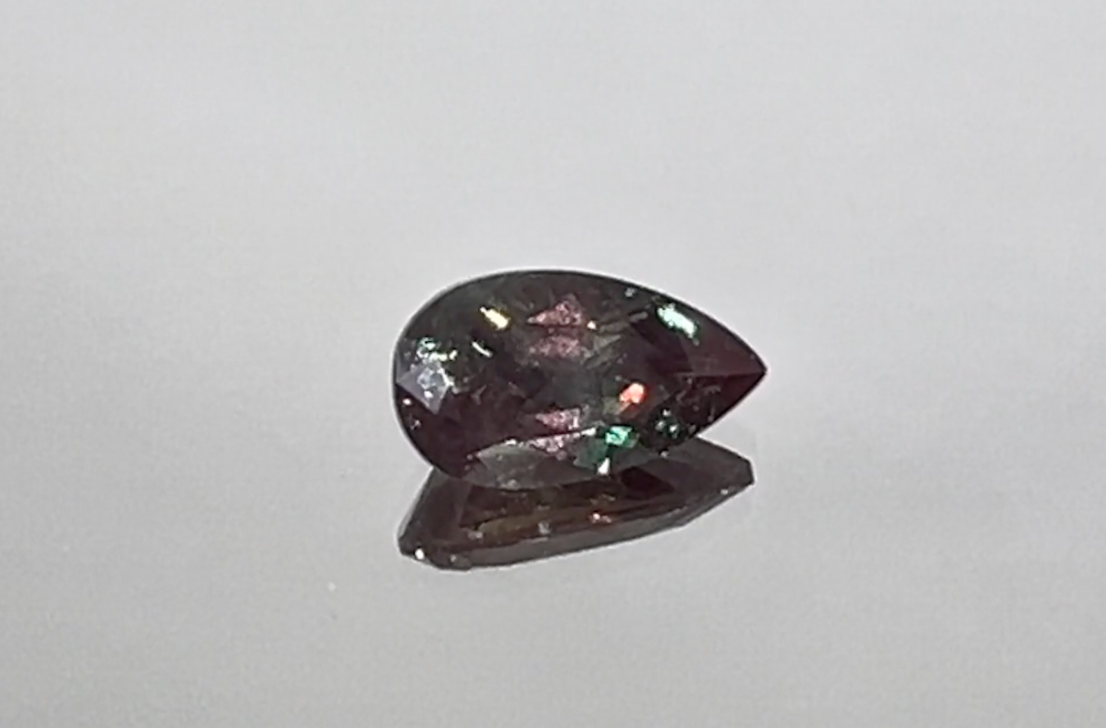 1.24ct 100% Change Russian Alexandrite Ring with D Flawless Diamonds set in 18K Yellow Gold