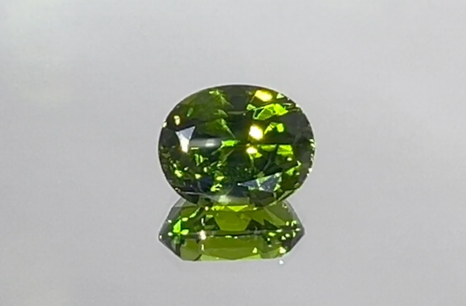 3.21ct Loope Clean Namibian Demantoid Ring with D Flawless Diamonds set in 18K White Gold