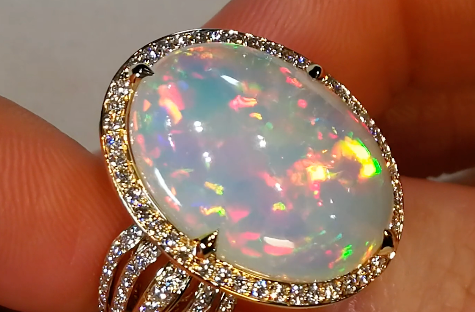 10.40ct Opal Ring with D Flawless Diamonds set in 18K Yellow Gold
