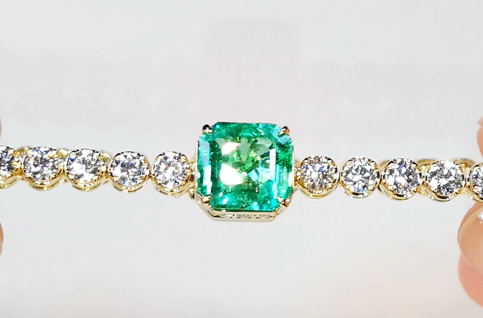 2.68ct Muzo Colombian Emerald Bracelet with 4.73ct D Flawless Diamonds set in 18K Yellow Gold