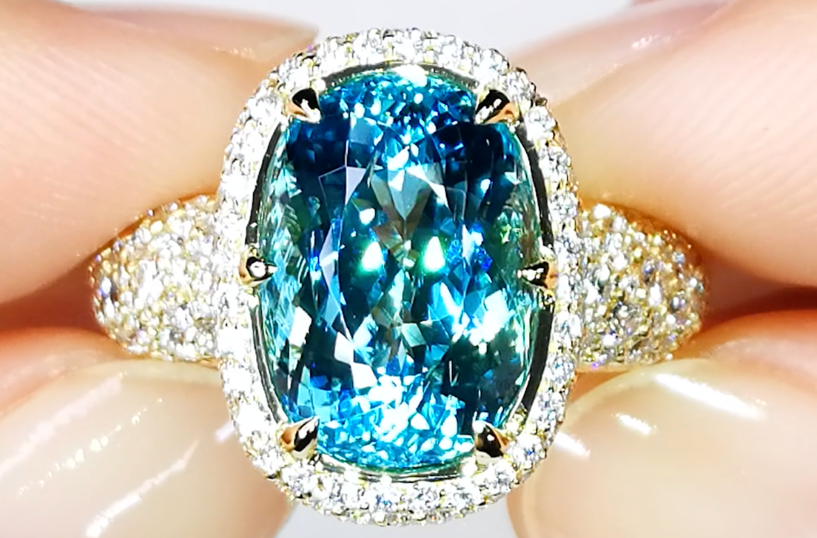 6.96ct Neon Electric Unheated Paraiba Tourmaline Ring with D Flawless Diamonds set in 18K Yellow Gold