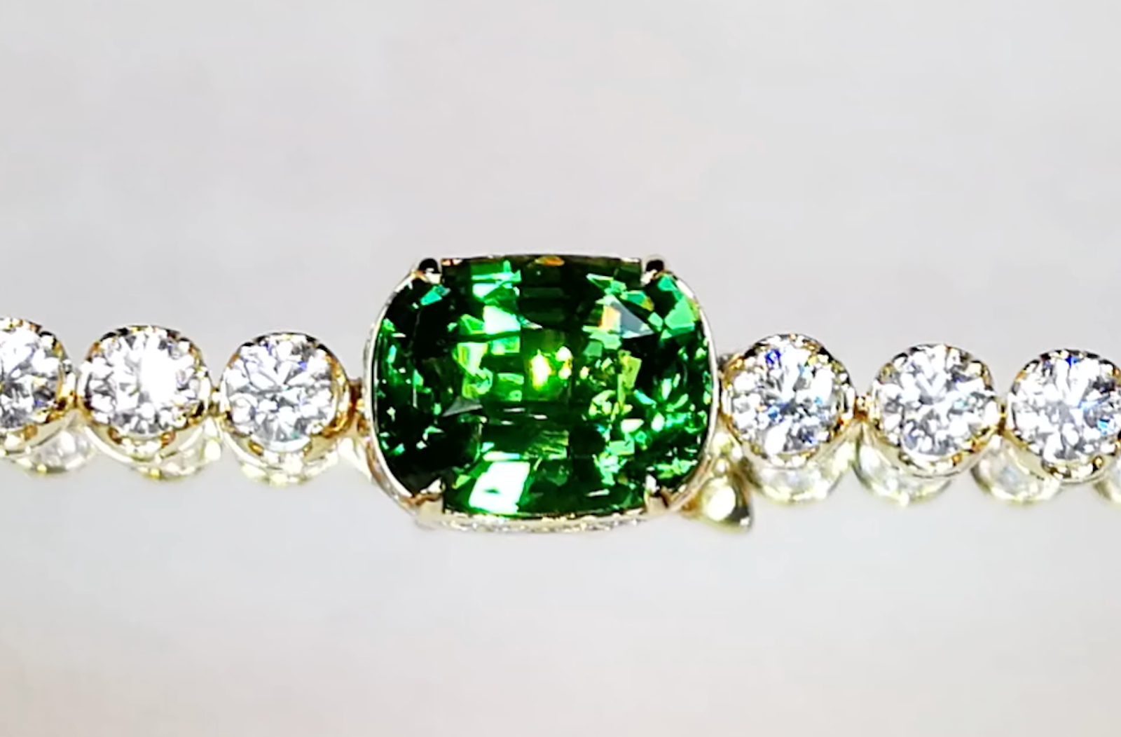 3.04ct Neon Tsavorite Bracelet with 4.62ct D Flawless Diamonds set in 18K Yellow Gold