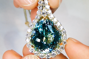 24.91ct Flawless Unheated Paraiba Tourmaline Necklace with D Flawless Diamonds set in 18K Yellow Gold