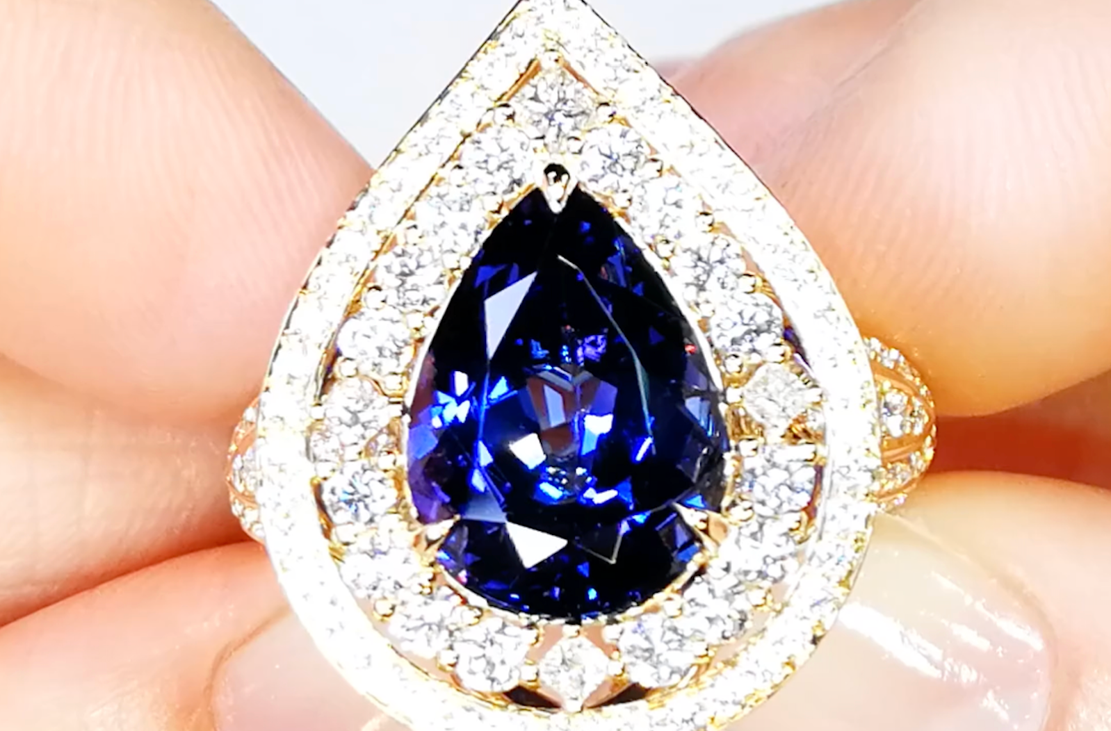 6.02ct Vivid Blue Tanzanite Ring with D Flawless Diamonds set in 18K Yellow Gold
