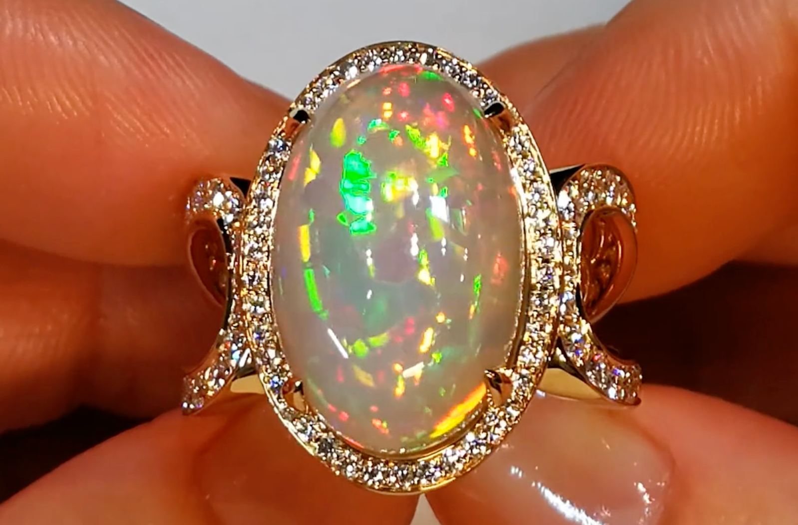 10.12ct Indonesian Black Opal Ring with D Flawless Diamonds set in 18K Yellow Gold