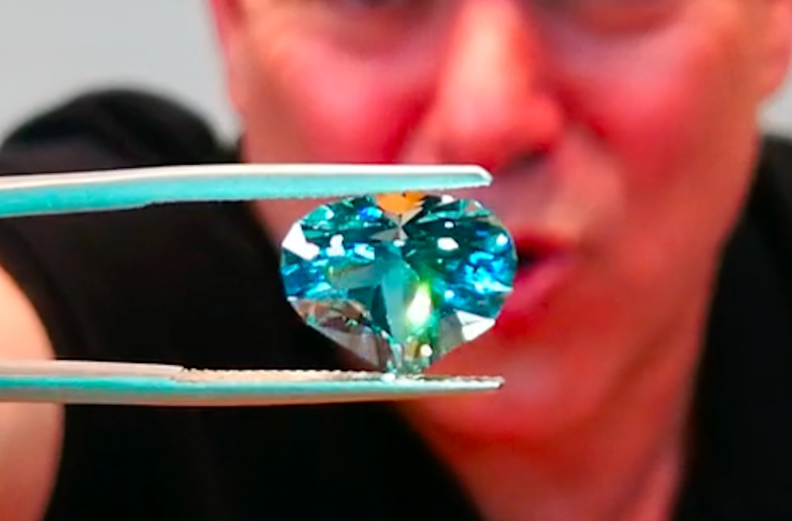 7.21ct Unheated Baby Lumina Flawless Paraiba Tourmaline Ring with D Flawless Diamond set in 18K Gold