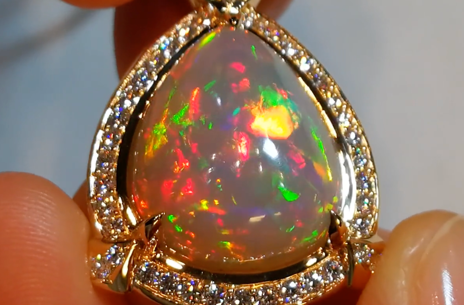 12.26ct Indonesian Black Opal Necklace with D Flawless Diamonds set in 18K Yellow Gold