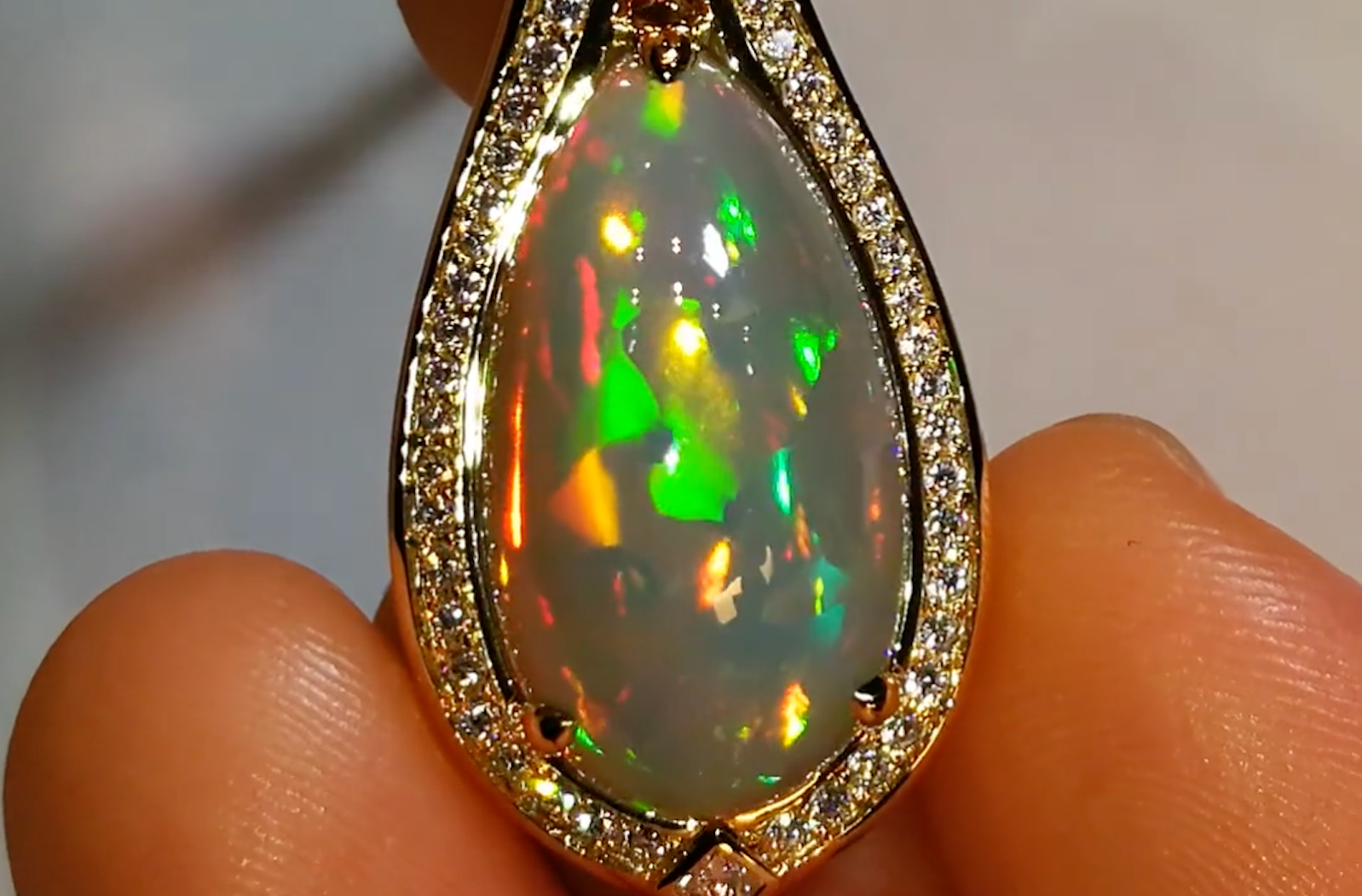 9.62ct Indonesian Black Opal Necklace with D Flawless Diamonds set in 18K Yellow Gold