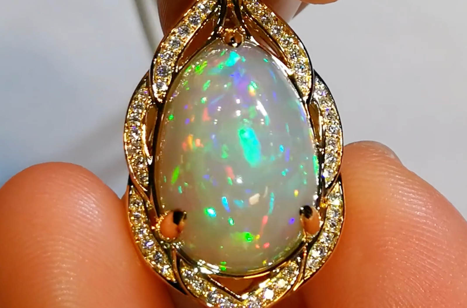 12.74ct Indonesian Black Opal Necklace with D Flawless Diamonds set in 18K Yellow Gold