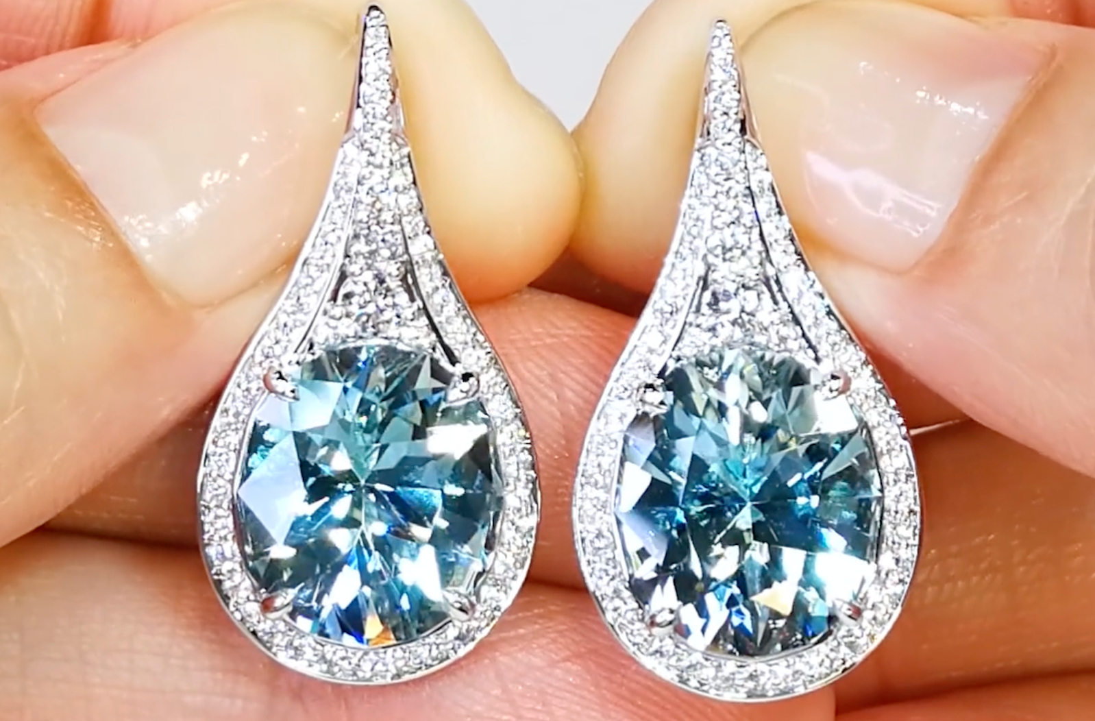 10-12 ct Unheated Baby Lumina Flawless Paraiba Tourmaline Earrings with D Flawless Diamonds set in 18K White Gold