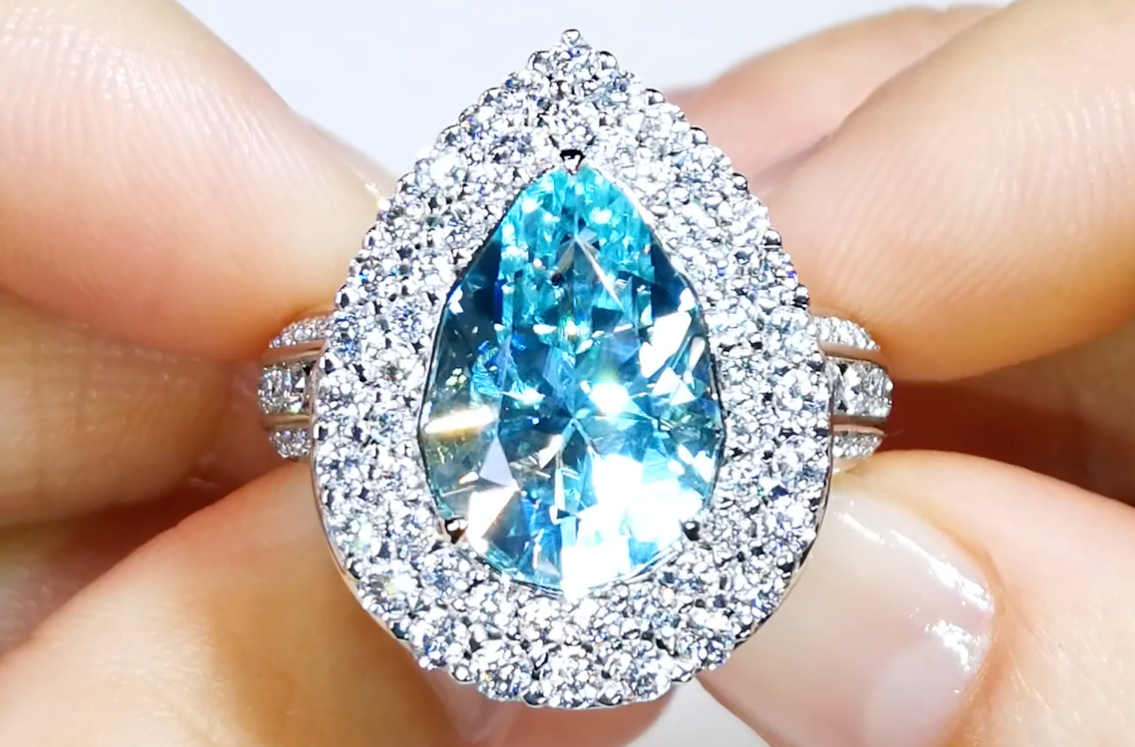 5-6ct Unheated Baby Lumina Flawless Paraiba Tourmaline Ring with D Flawless Diamonds set in 18K White Gold