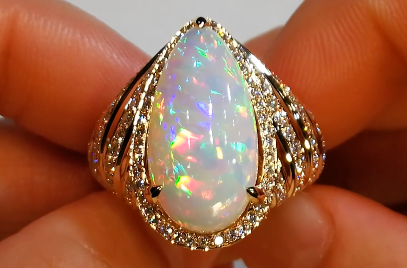 8.36ct Opal Ring with D Flawless Diamonds set in 18K Yellow Gold