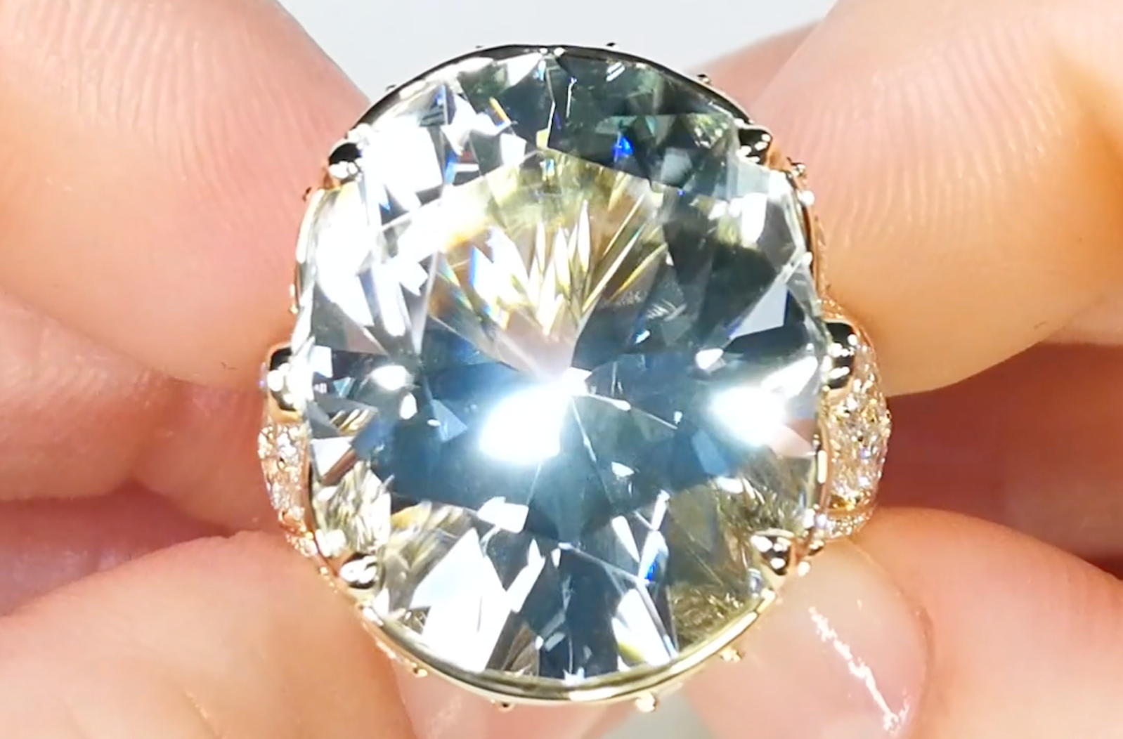 28.11ct Neon Colorless Tourmaline Ring with D Flawless Diamonds set in 18K Yellow Gold