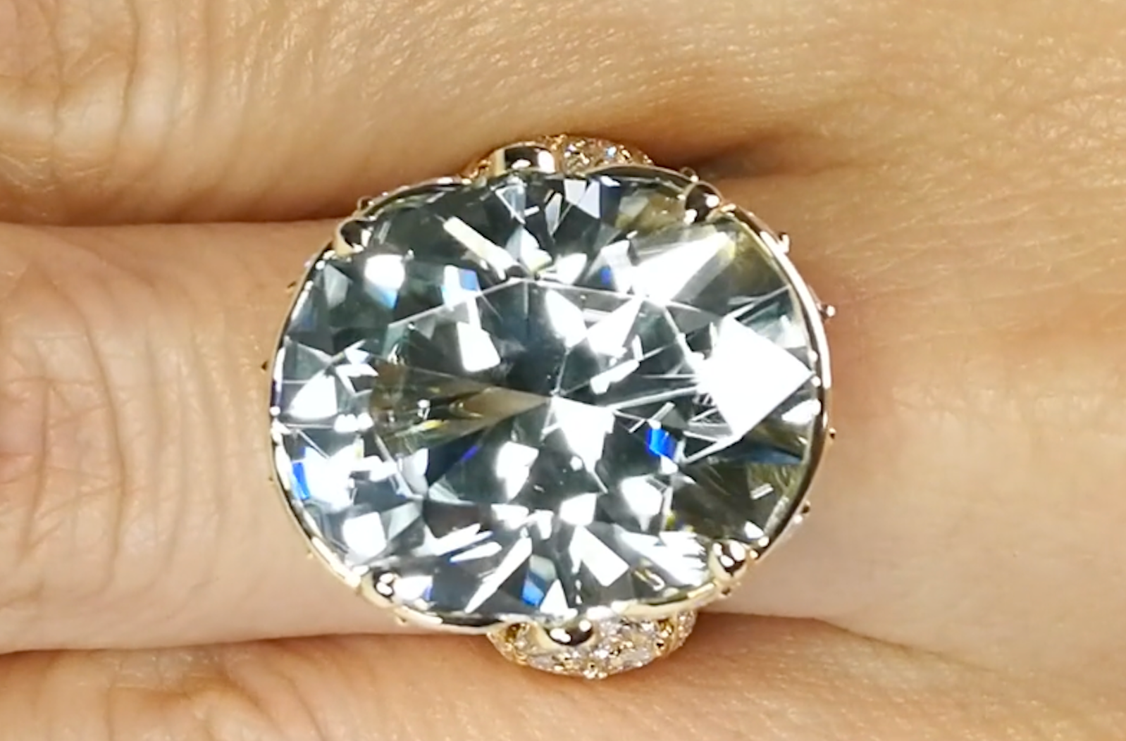 28.11ct Neon Colorless Tourmaline Ring with D Flawless Diamonds set in 18K Yellow Gold