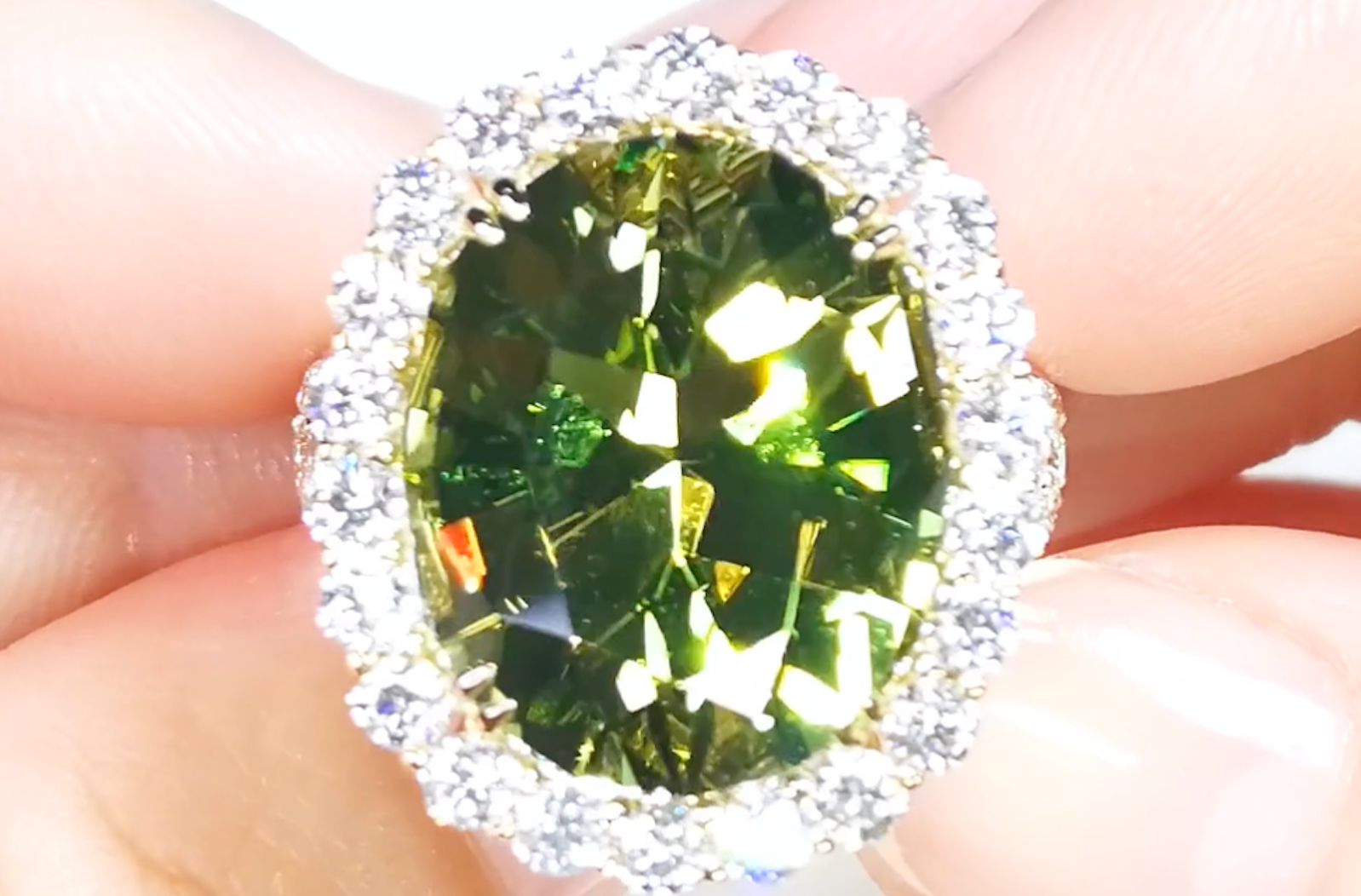 14.82ct Unheated Paraiba Tourmaline Ring with D Flawless Diamonds set in 18K Yellow Gold