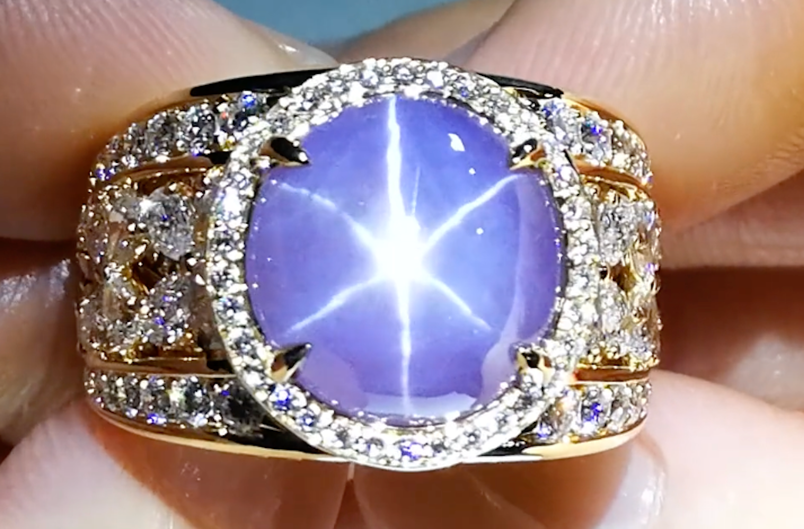 12.15ct Unheated Ceylon Star Sapphire Ring with D Flawless Diamonds set in 18K Yellow Gold