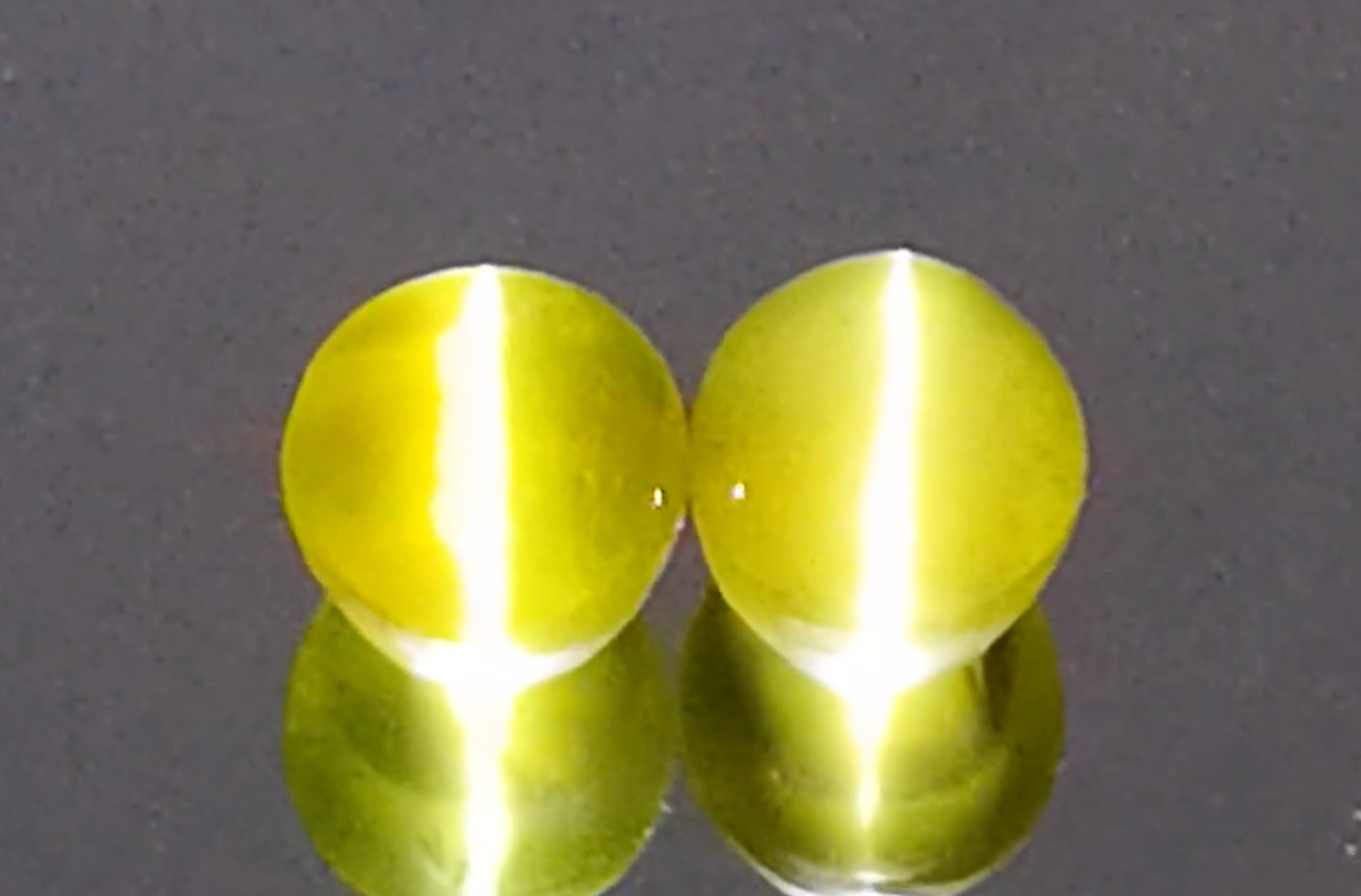 15.87ct Cat’s Eye Neon Chrysoberyl Earrings with D Flawless Diamonds set in 18K Yellow Gold