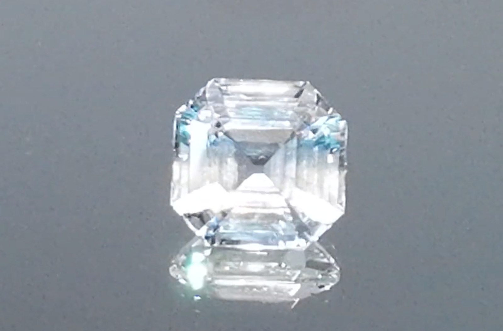 8.33ct Asscher Unheated Ceylon White Sapphire Ring with D Flawless Diamonds set in 18K White Gold