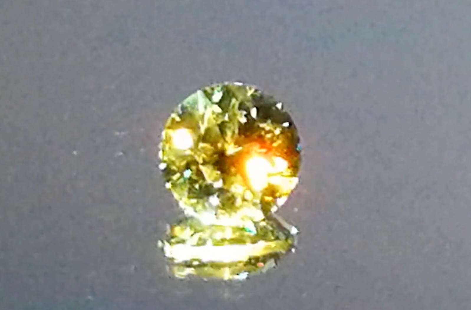 1.21ct Russian Horsetail Color Change Demantoid Ring with D Flawless Diamonds set in 18K Yellow Gold