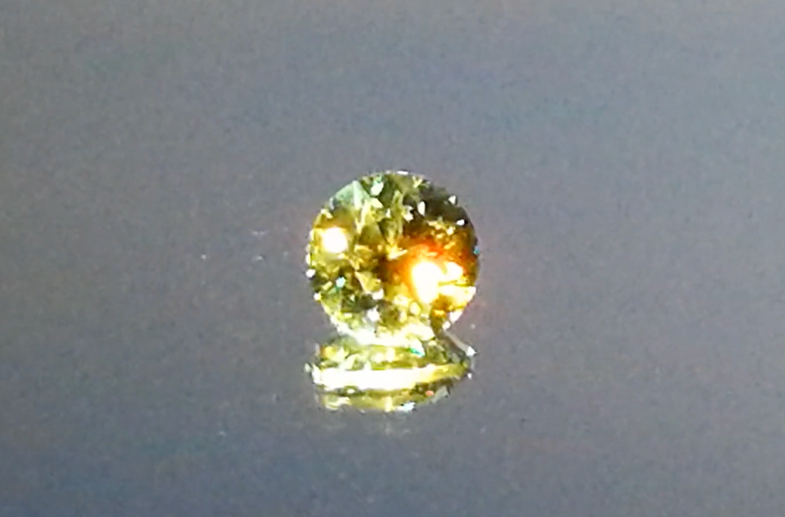 1.21ct Russian Horsetail Color Change Demantoid Ring with D Flawless Diamonds set in 18K Yellow Gold