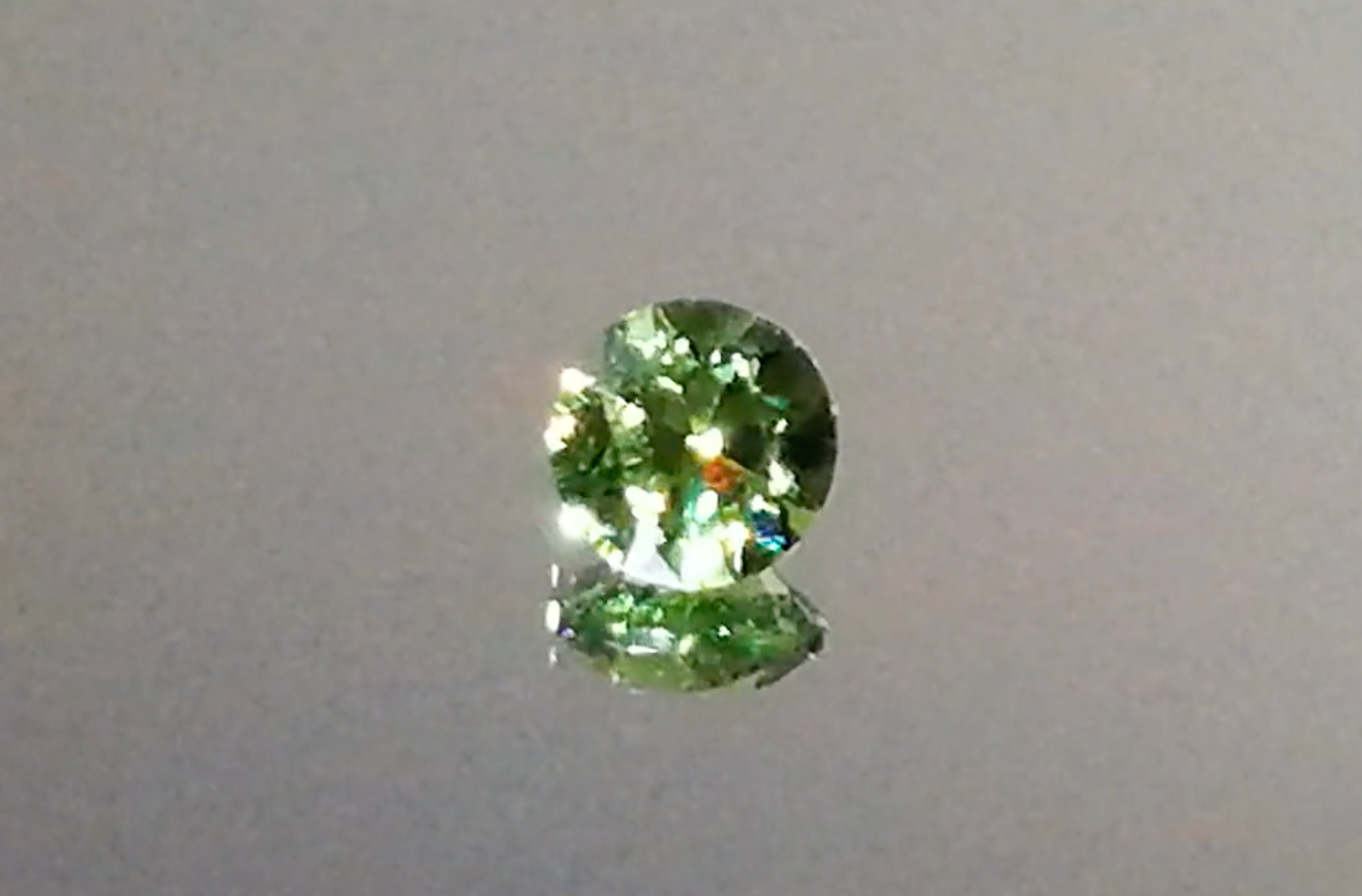 1.21ct Russian Horsetail Color Change Demantoid Ring with D Flawless Diamonds set in 18K Yellow Gold