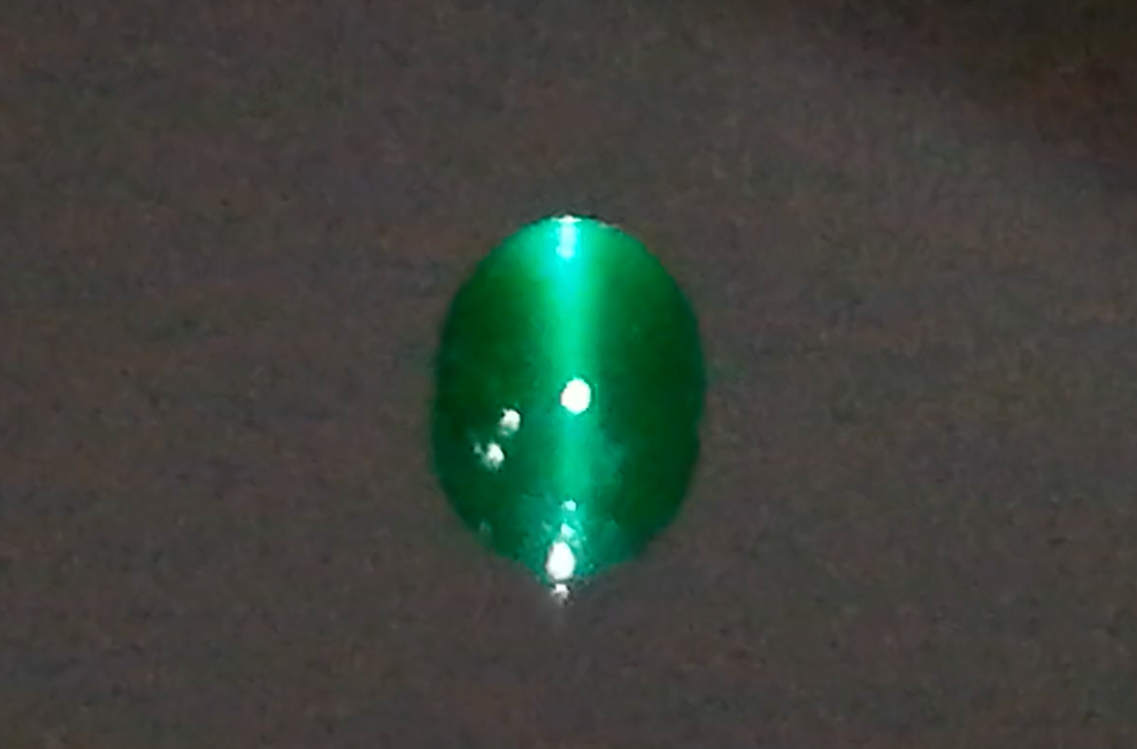 2.48ct 520 Million Year Old Vivid Green Cat’s Eye Emerald Ring with D Flawless Diamonds set in 18K Yellow Gold