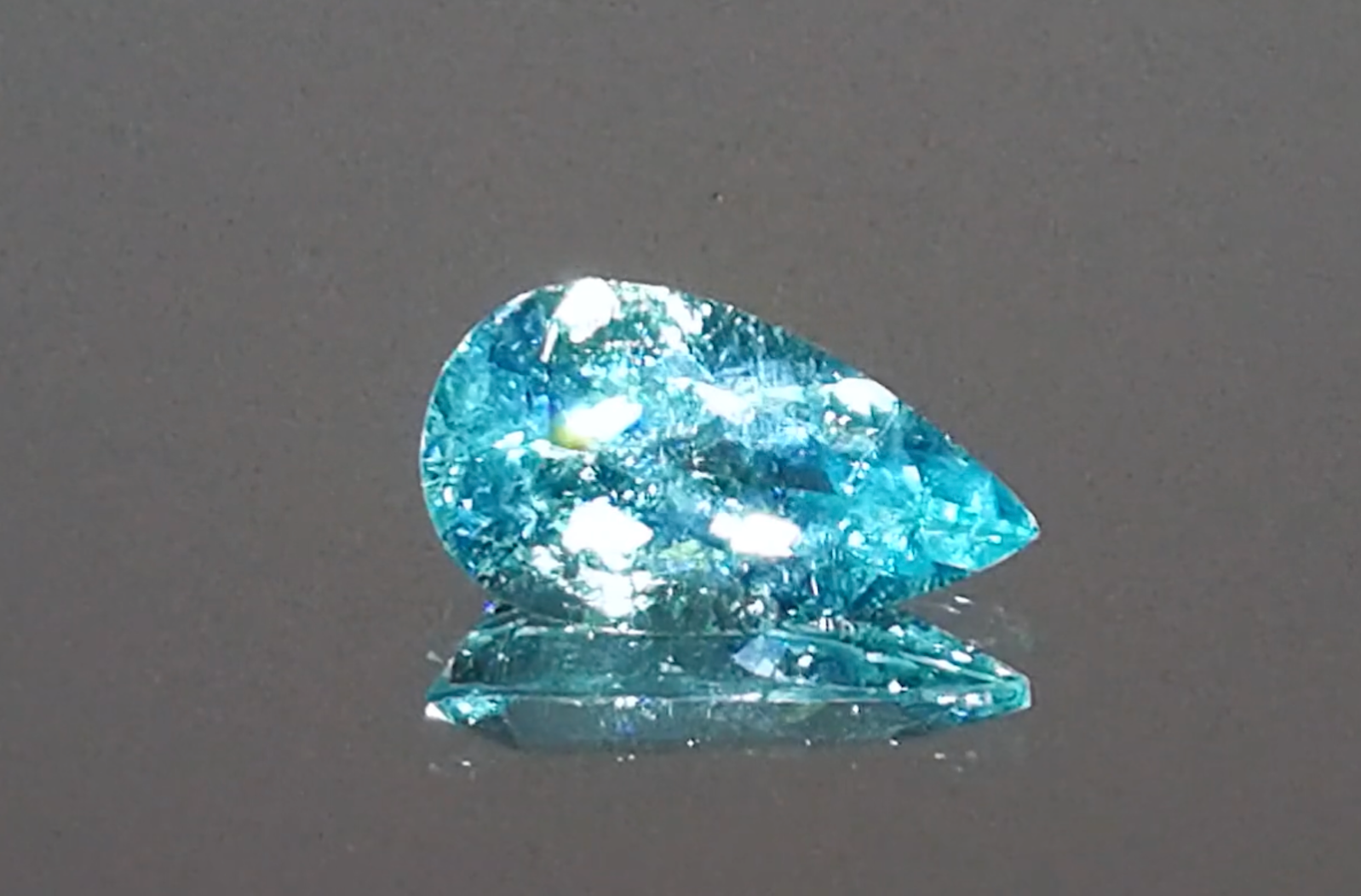 1.17ct Neon Brazilian Paraiba Ring with D Flawless Diamonds set in 18K White Gold