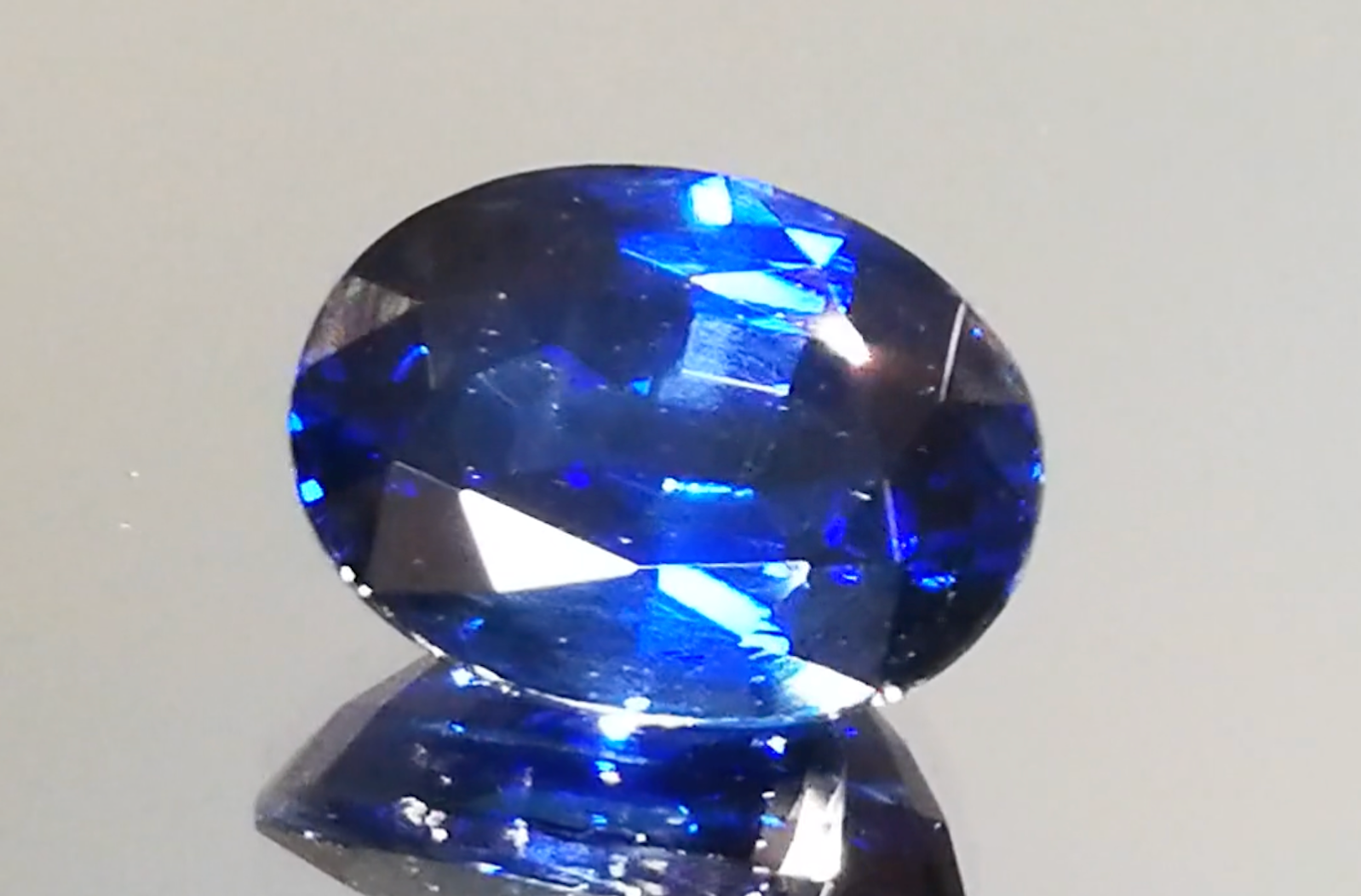 7.46ct Unheated Ethiopian Blue Sapphire Ring with D Flawless Diamonds set in 18K Yellow Gold