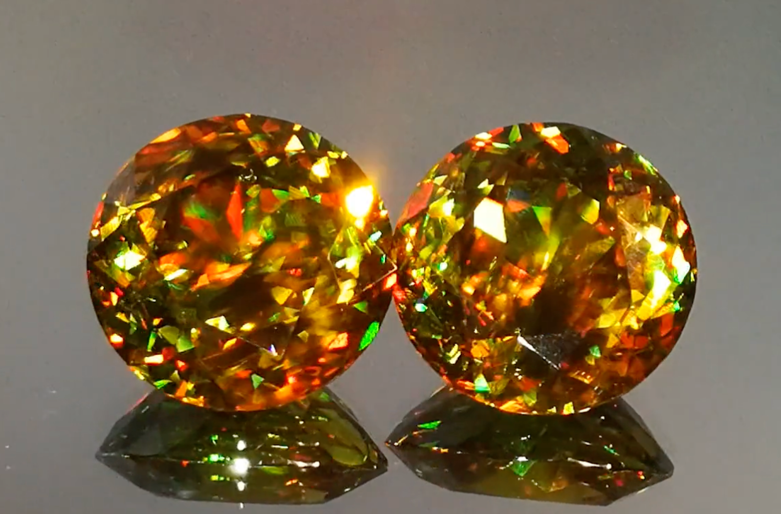 22.69ct Madagascar Sphene Earrings with D Flawless Diamonds set in 18K Yellow Gold
