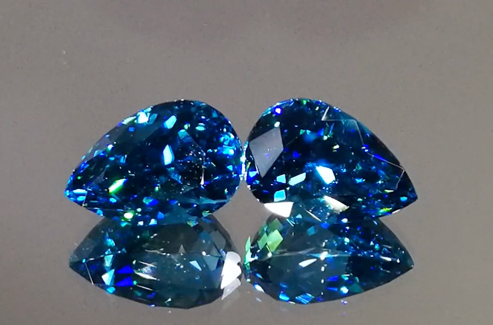 20.68ct Blue Zircon Earrings with D Flawless Diamonds set in 18K Yellow Gold