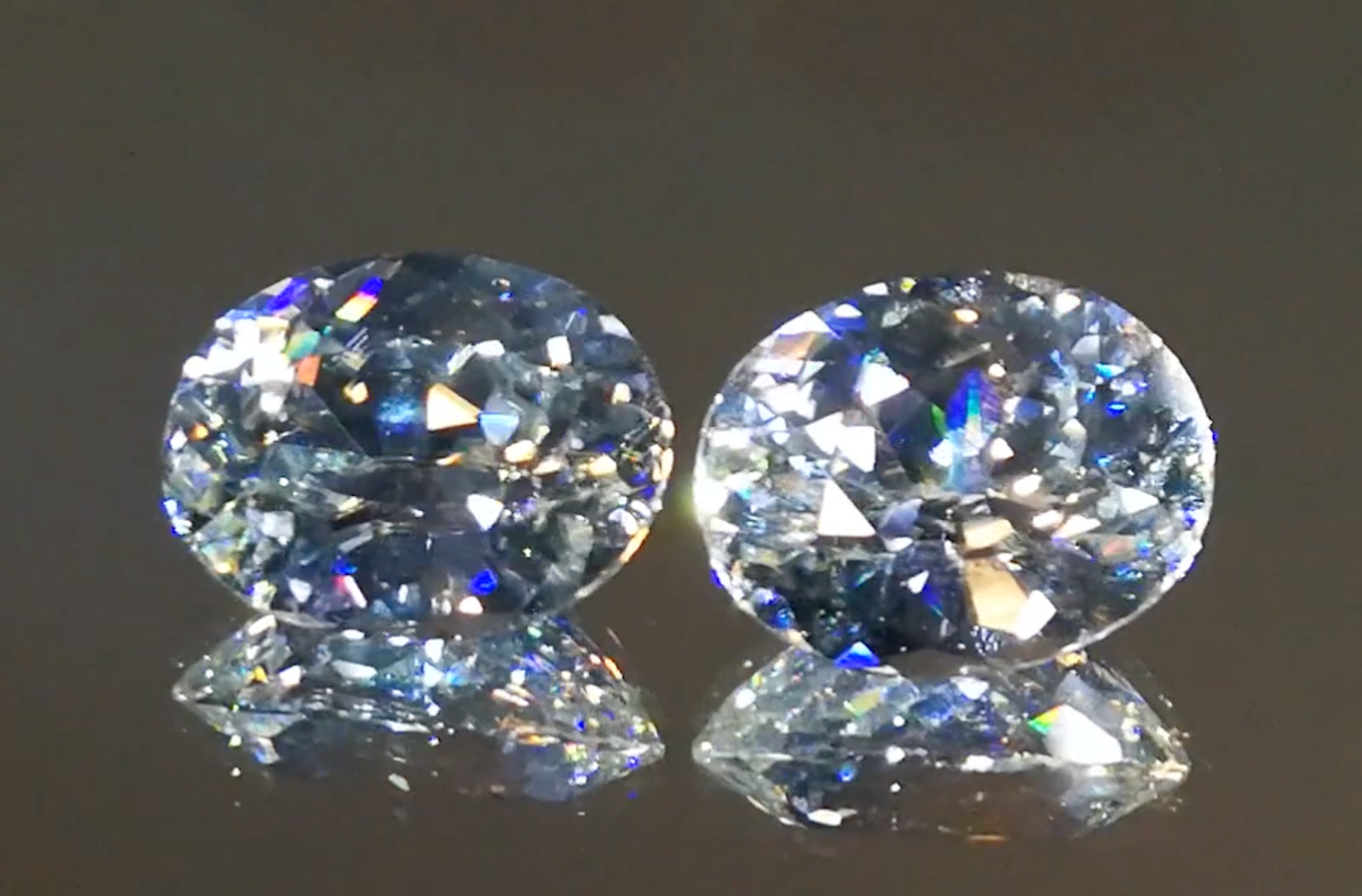 23.44ct Natural White Zircon Earrings with D Flawless Diamonds set in 18K Yellow Gold