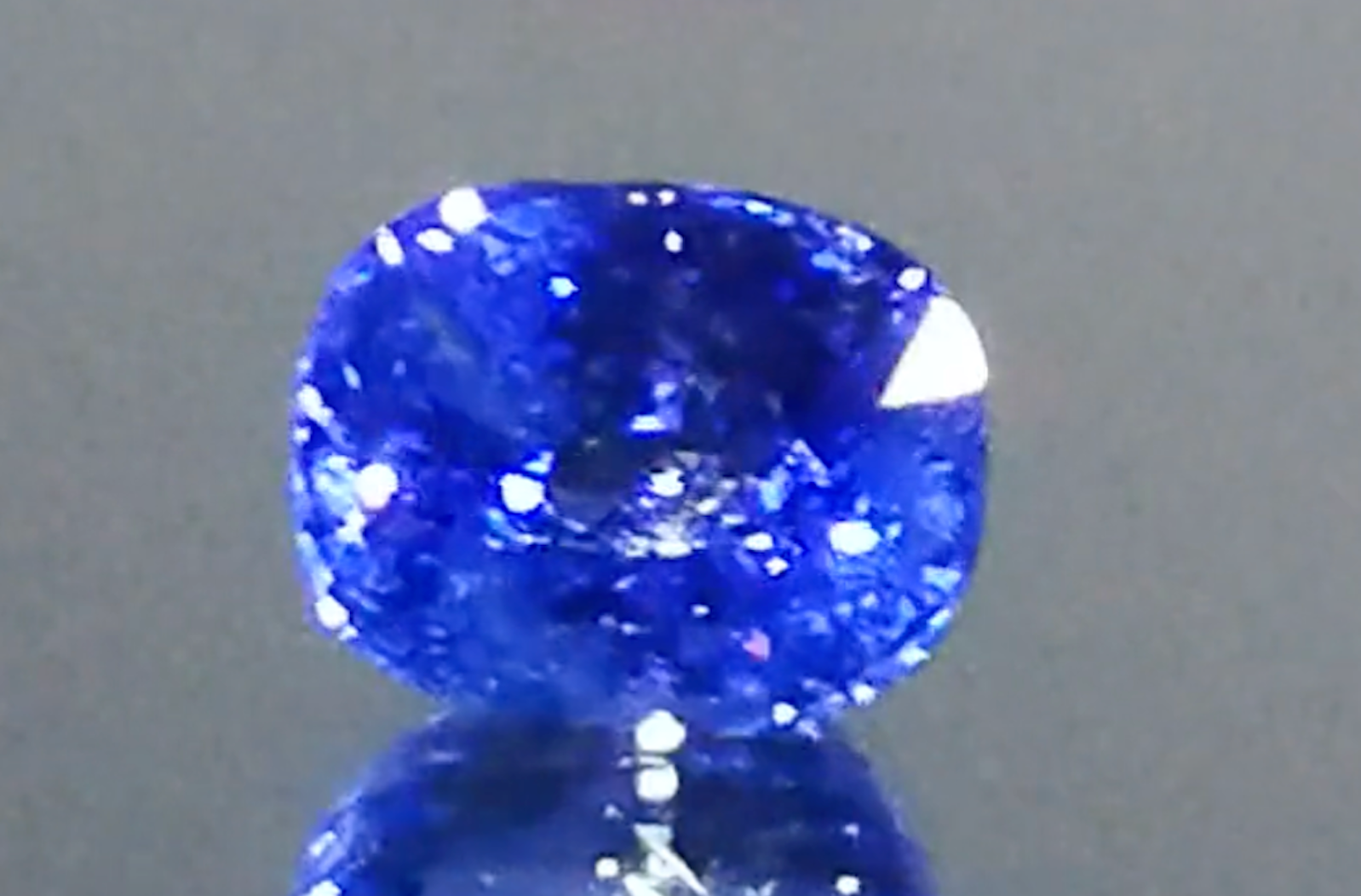 7.41ct Unheated Ceylon Blue Color Change Sapphire Ring with D Flawless Diamonds set in 18K White Gold
