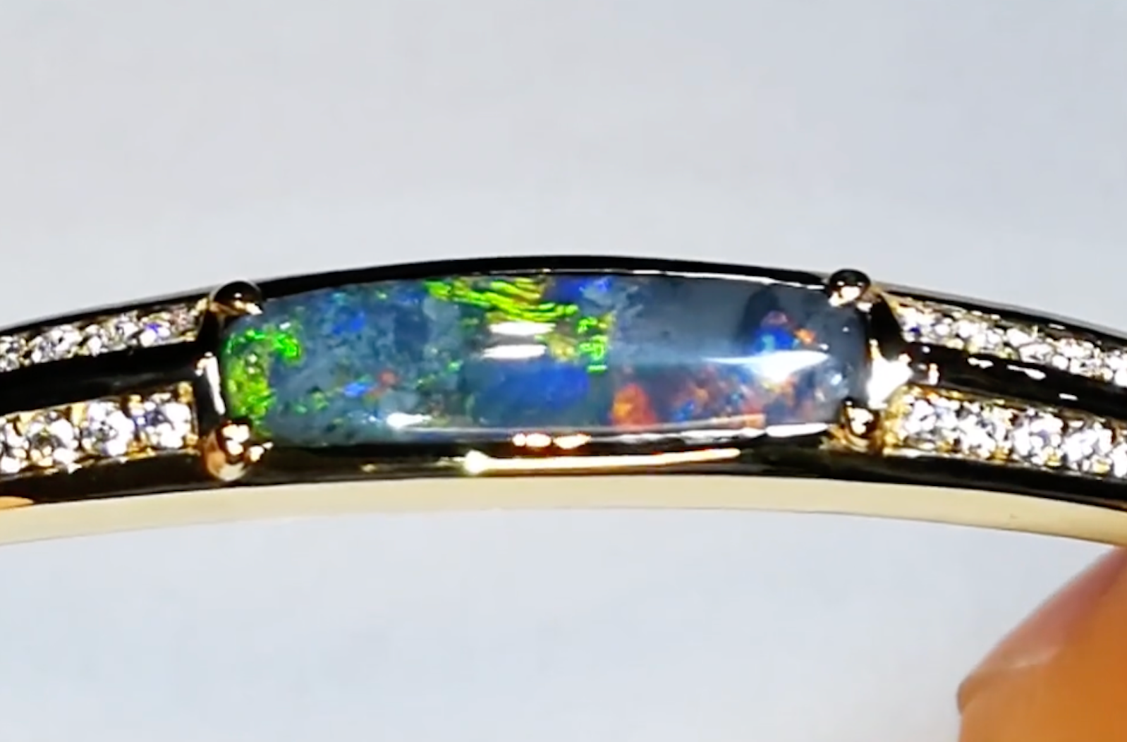 1.80ct Lightning Ridge Black Opal Bangle with D Flawless Diamonds set in 18K Yellow Gold